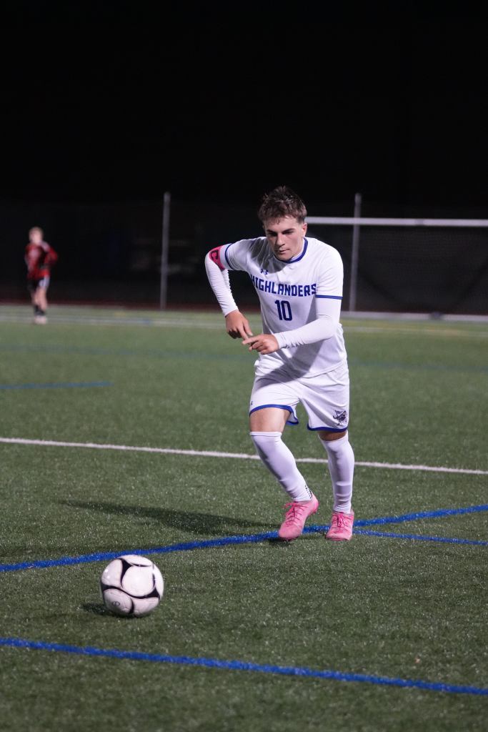 Robert Profeta, Herricks soccer player, dribbles a soccer ball.