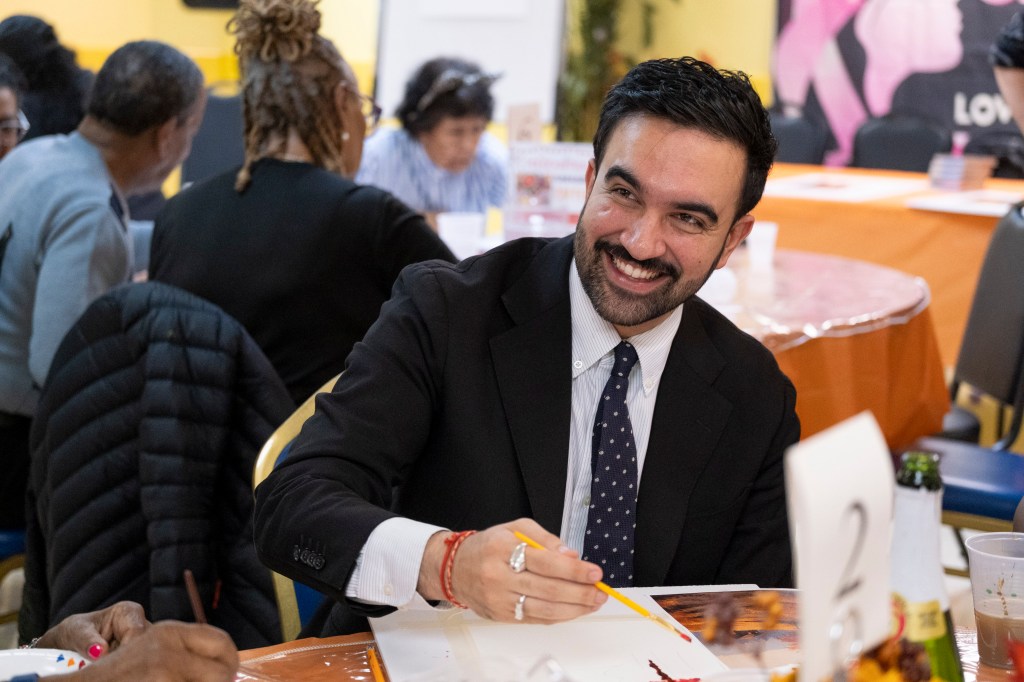 Mayoral candidate Zohran Mamdani participates in a paint and sip at a senior center.
