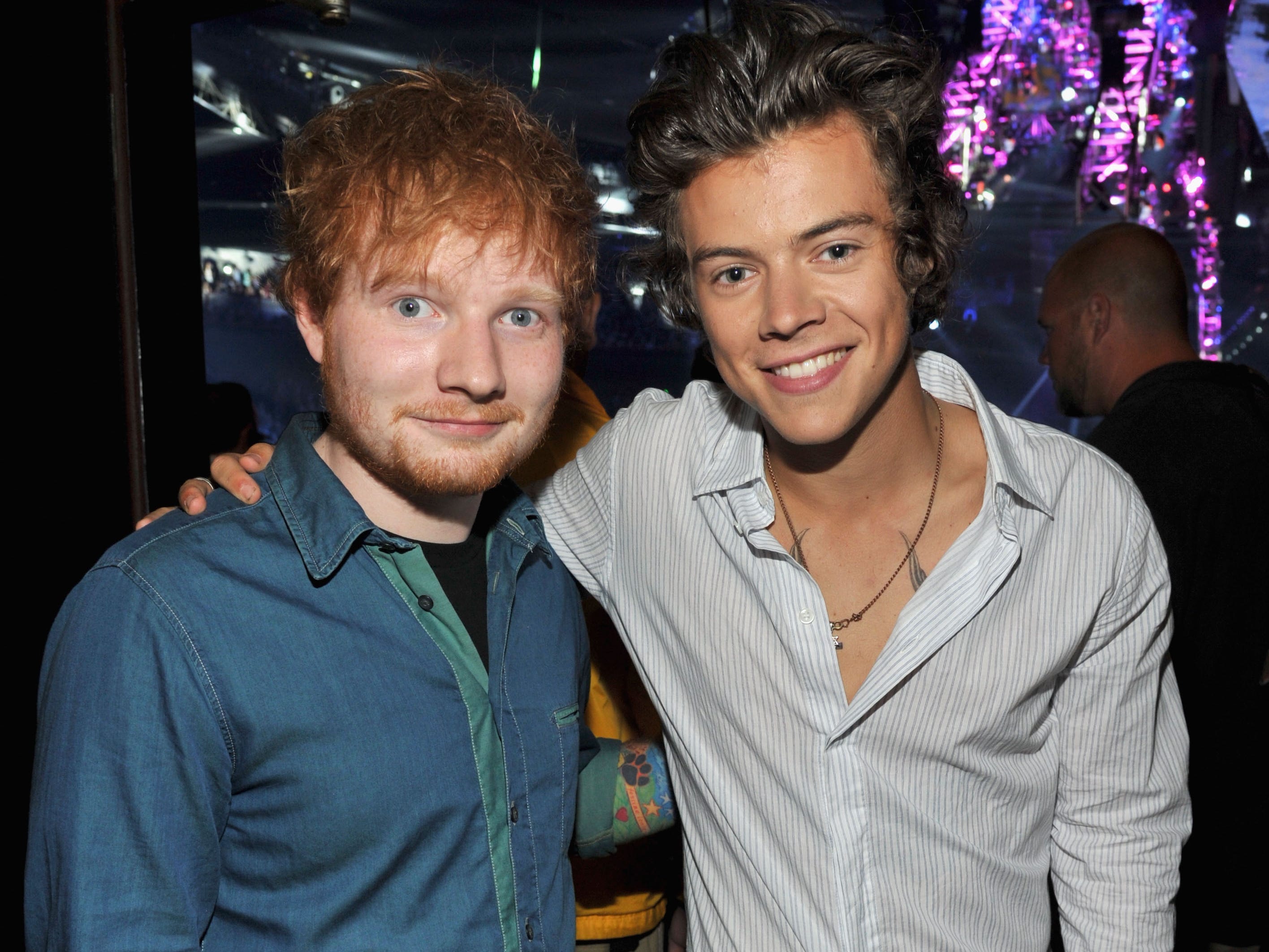Musicians Ed Sheeran (L) and Harry Styles of One Direction attend the 2013 Teen Choice Awards at Gibson Amphitheatre on August 11, 2013