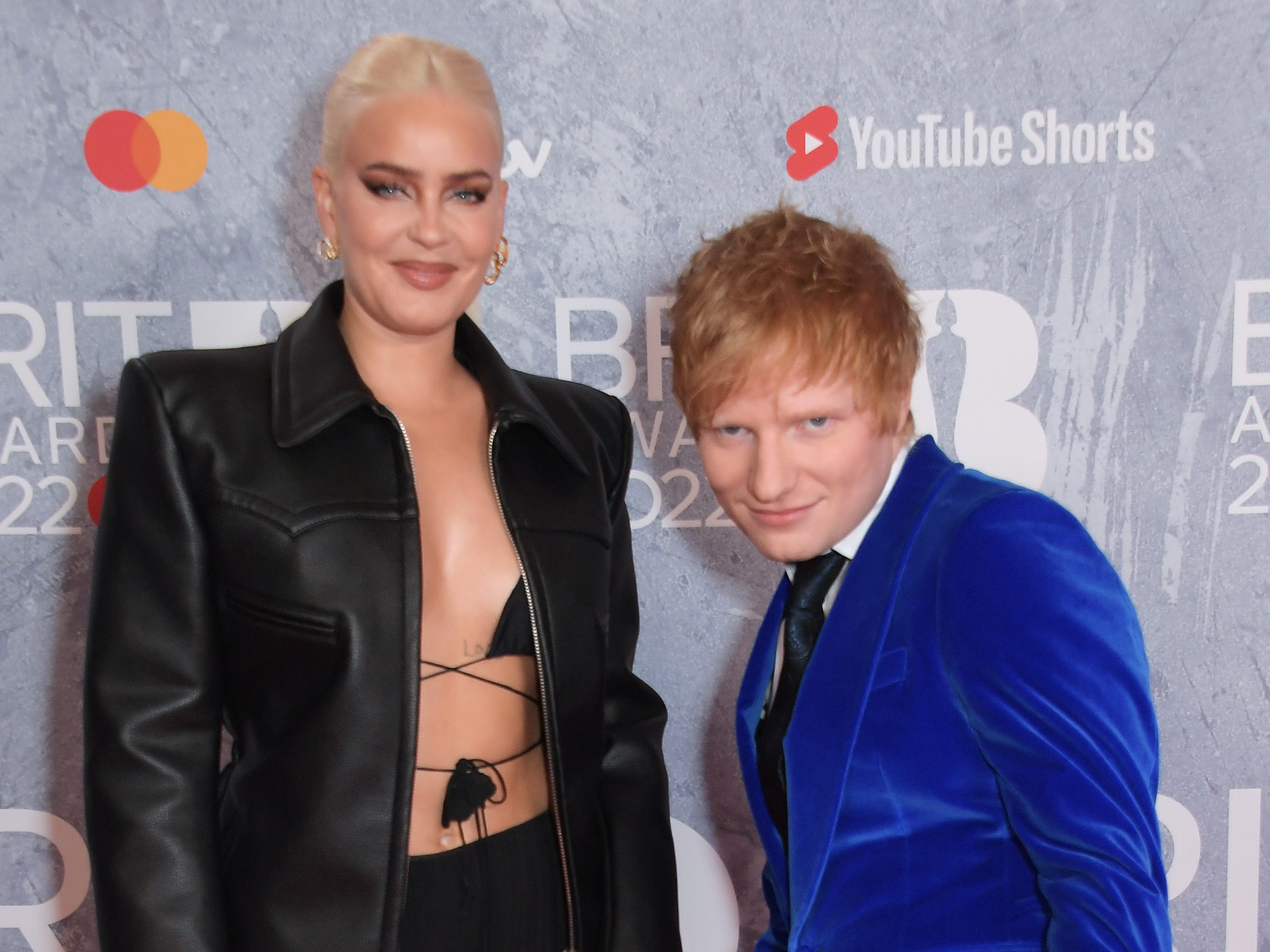 Anne-Marie and Ed Sheeran arrive at The BRIT Awards 2022 at The O2 Arena on February 8, 2022 in London, England.