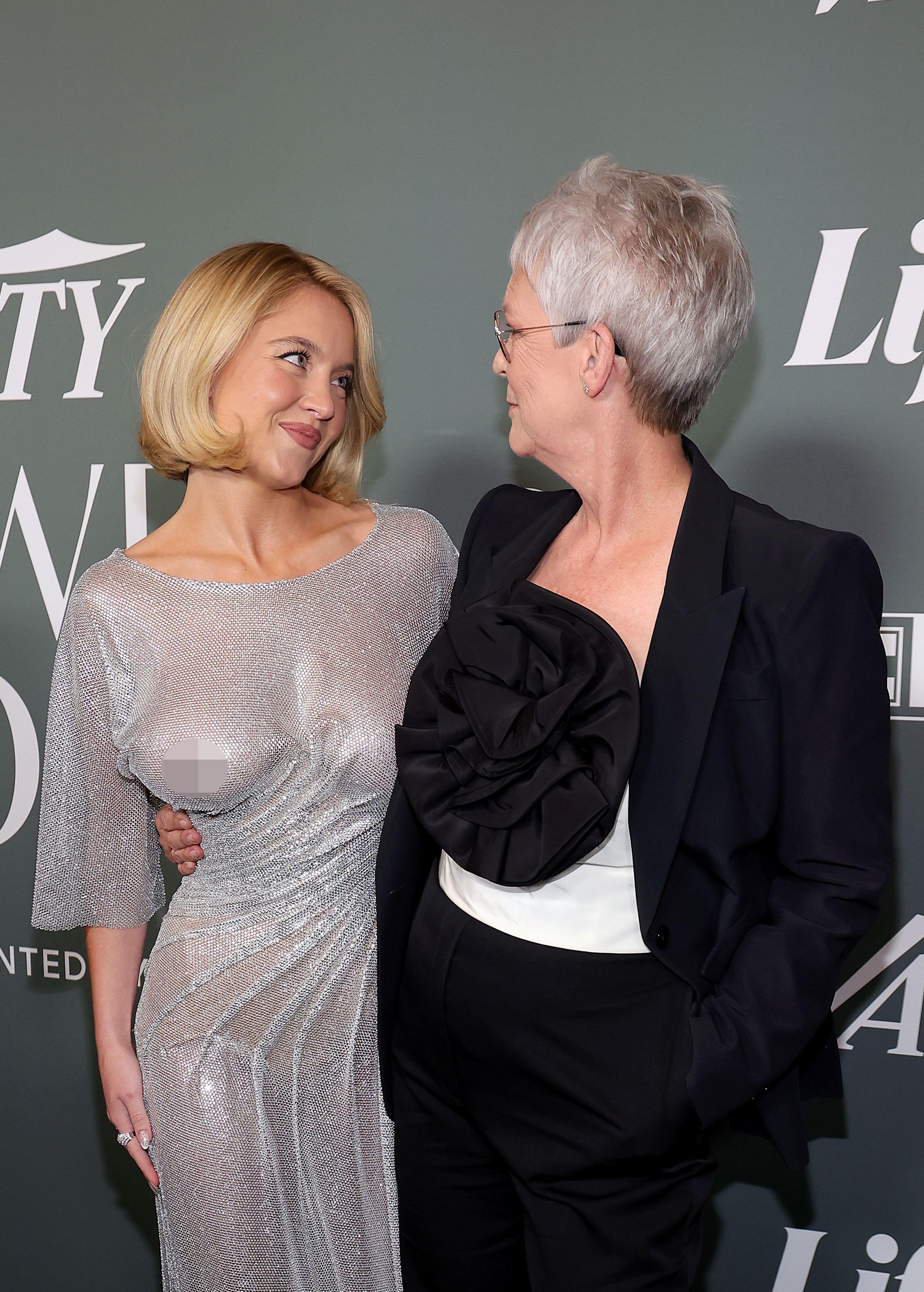 Sydney Sweeney in a sparkling silver dress and Jamie Lee Curtis in a black suit with a large black rose detail, at Variety's 2025 Power of Women event.