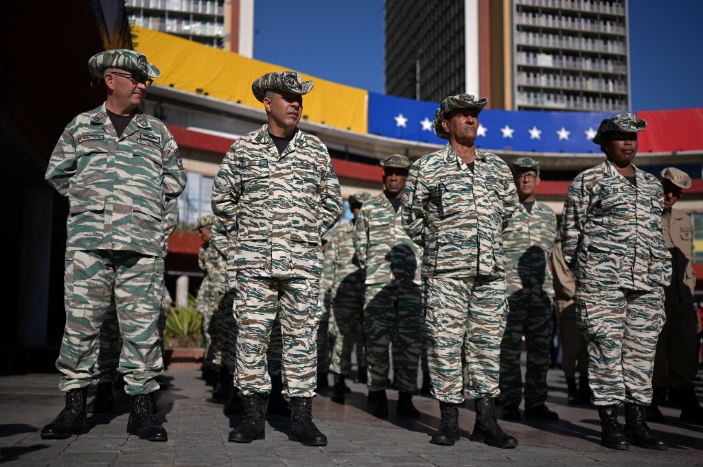Members of the Bolivarian Militia stand in formation in Caracas, Venezuela.