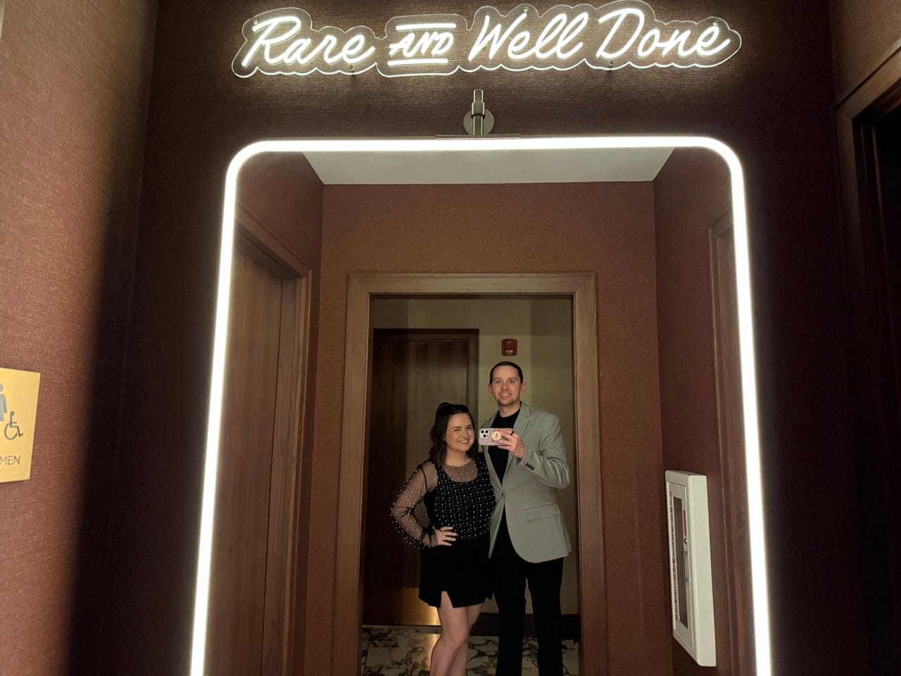 Author and partner taking selfie in mirror