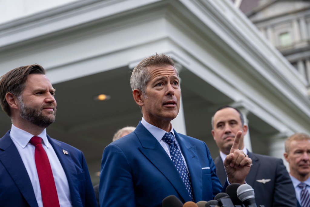Vice President JD Vance and Transportation Secretary Sean Duffy speak to media outside the West Wing.