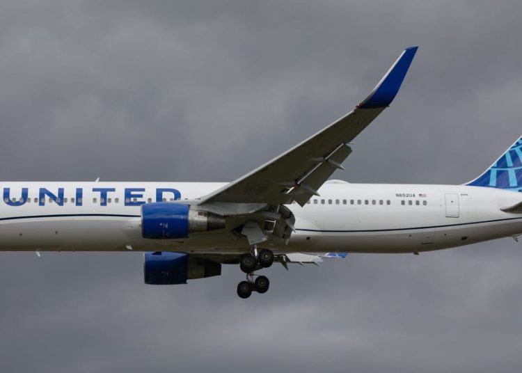 A United flight u-turned over the Atlantic coast when a passenger’s laptop fell through a gap into the plane’s hold