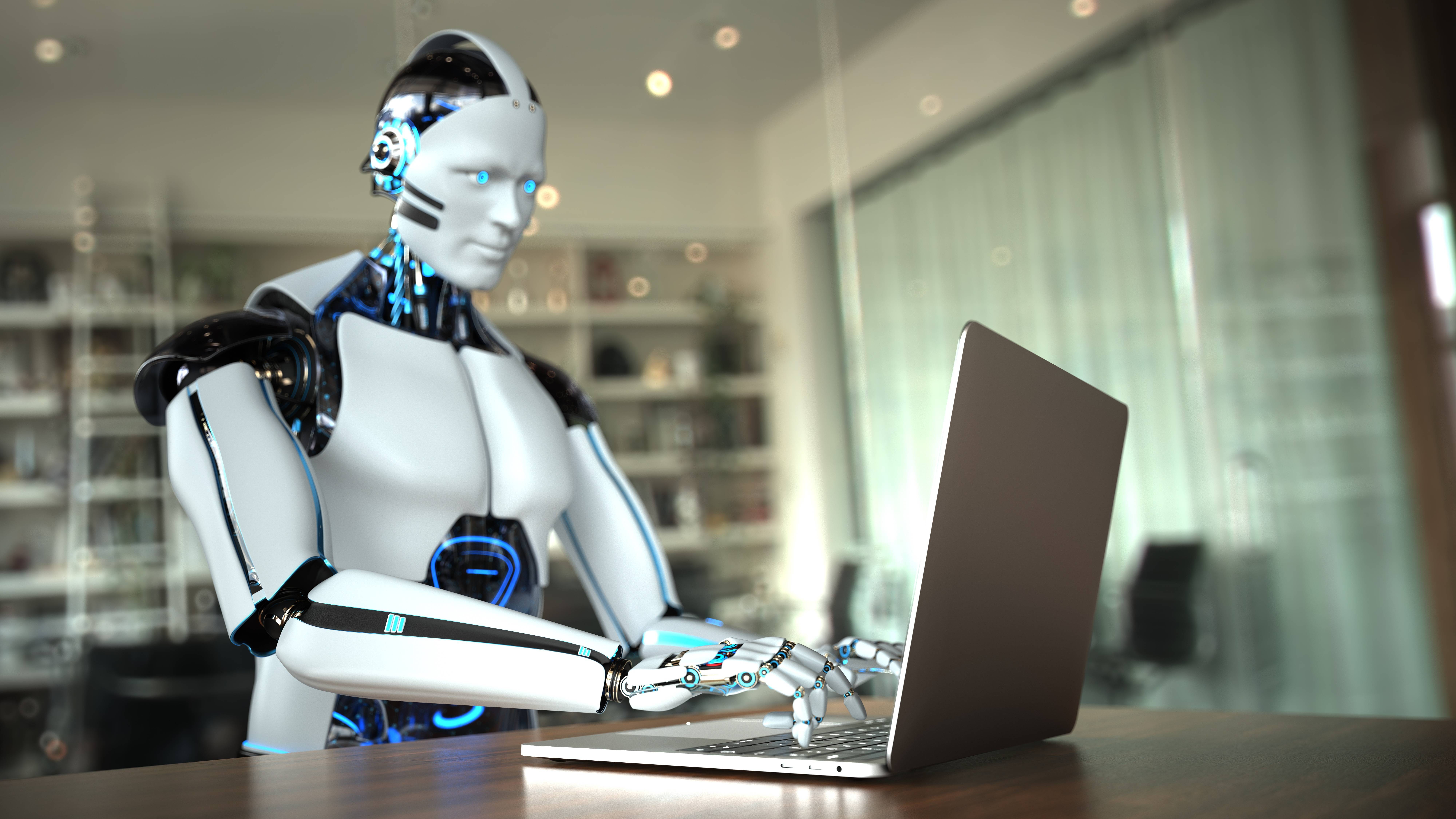 Humanoid chat robot humanoid robot typing on a computer in an office