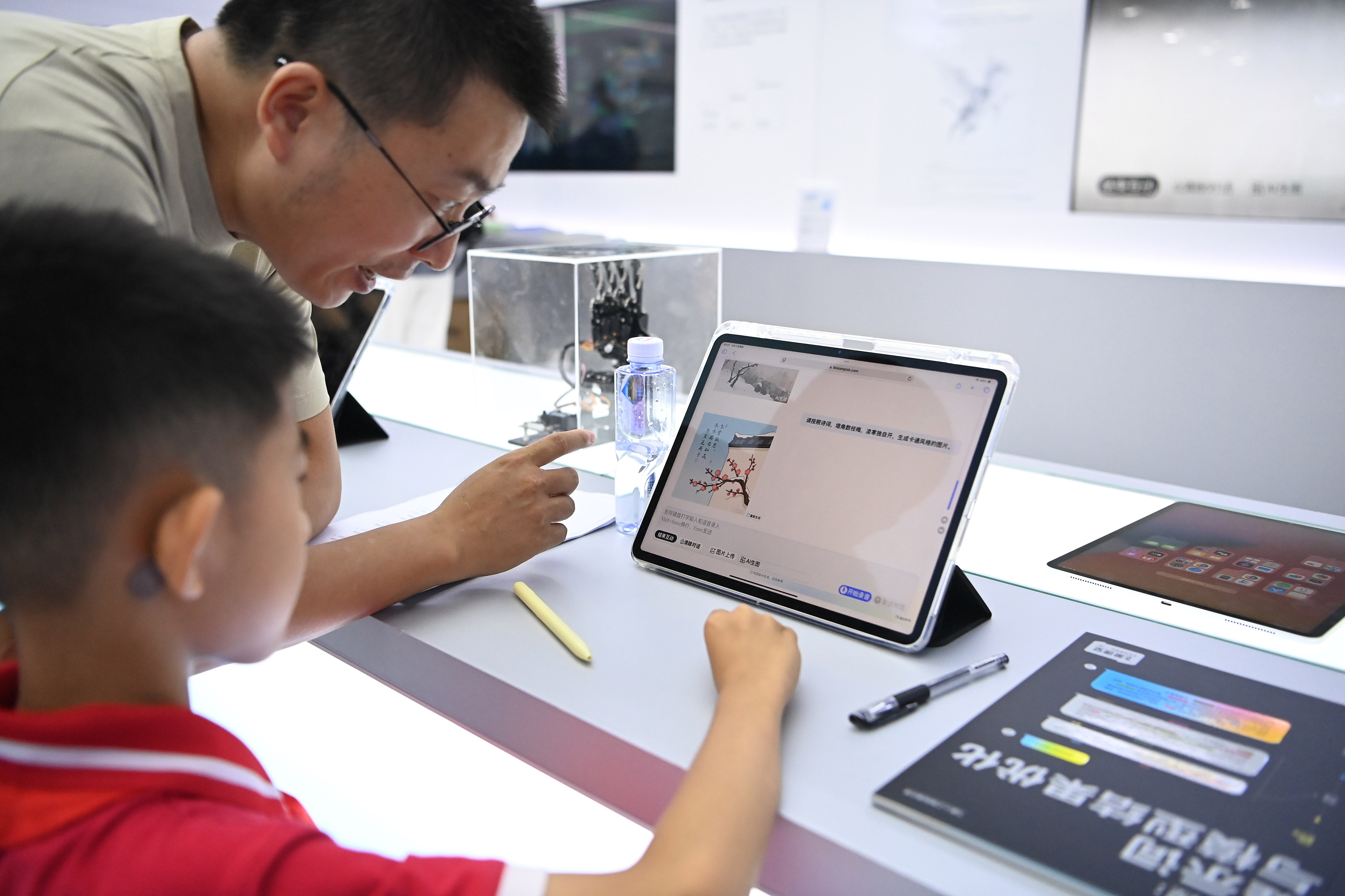 A student has a class in an artificial intelligence interactive classroom at the 2025 China International Fair for Trade in Services CIFTIS in Beijing, capital of China, September 11, 2025.