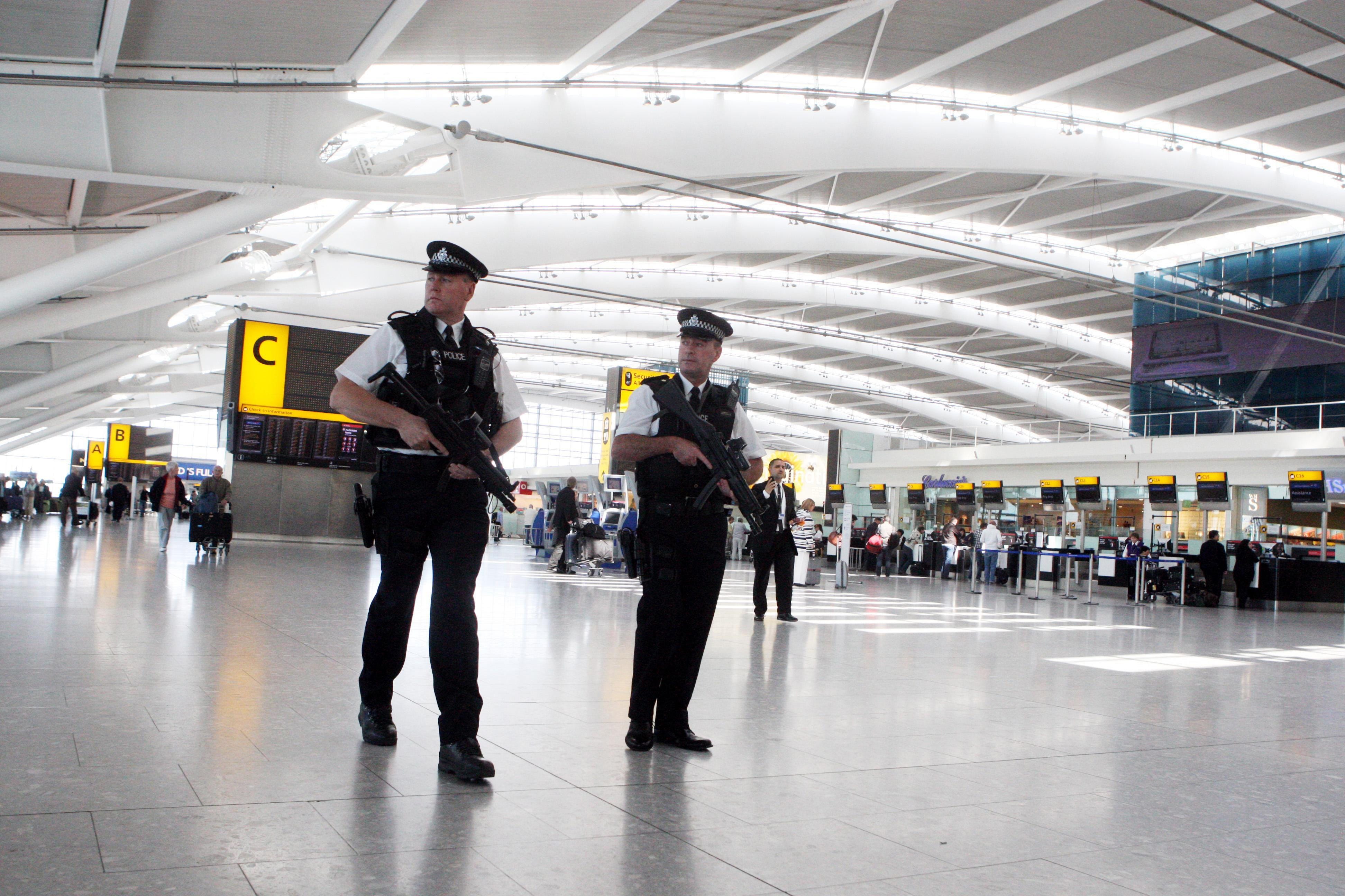 Police officers during a routine patrol in Terminal 5 of Heathrow Airport.
