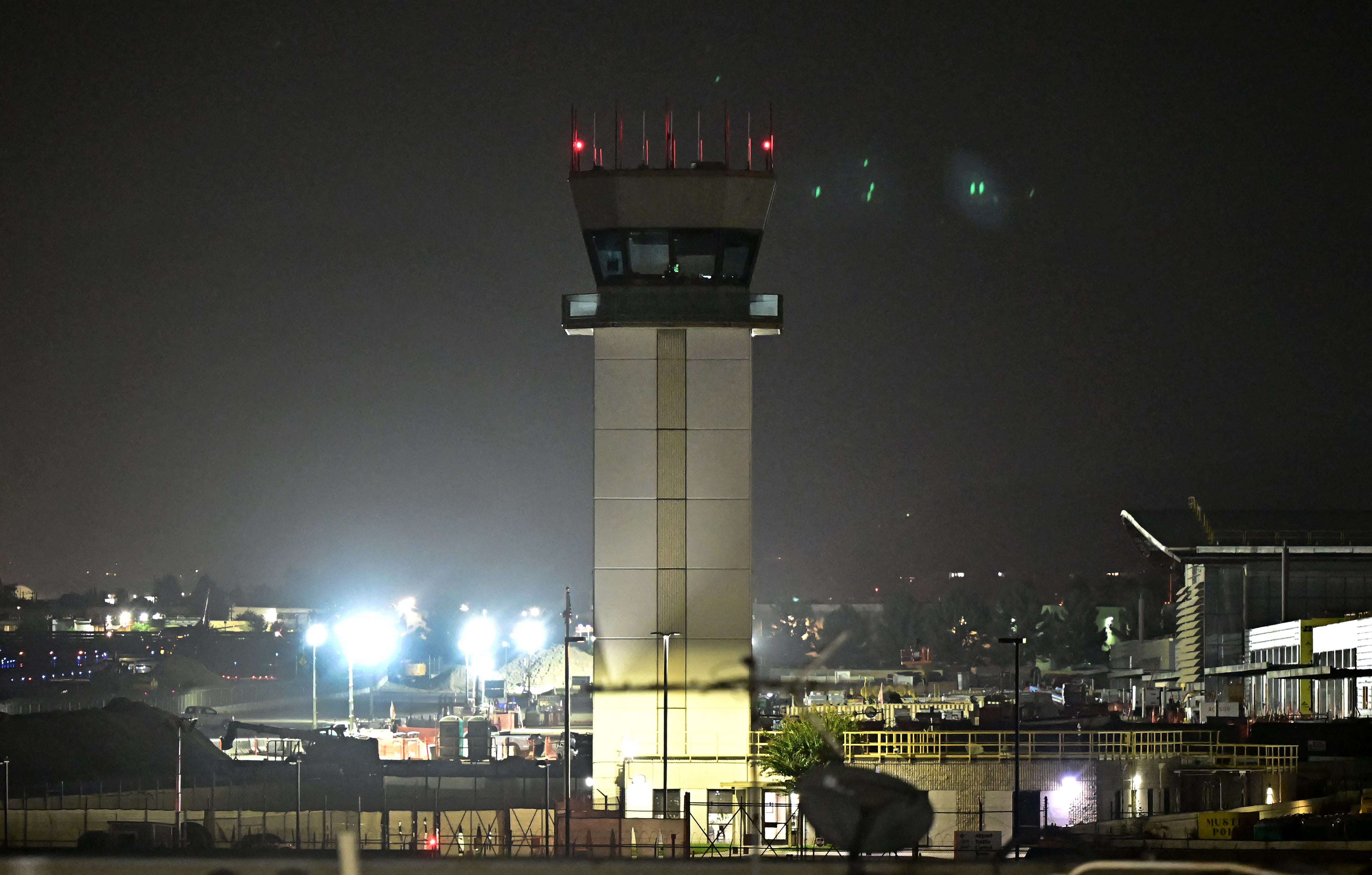 A dark and unstaffed air traffic control tower is seen at the Hollywood Burbank Airport on October 6, 2025 in Burbank, California.