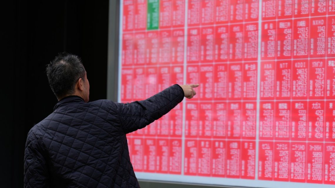 Asian shares are mixed as region watches for outcome from Trump’s visits