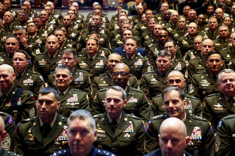 Members of the military attend a meeting convened by U.S. Defense Secretary Pete Hegseth, at Marine Corps Base Quantico, in Quantico, Virginia, U.S., September 30, 2025. REUTERS/Kevin Lamarque