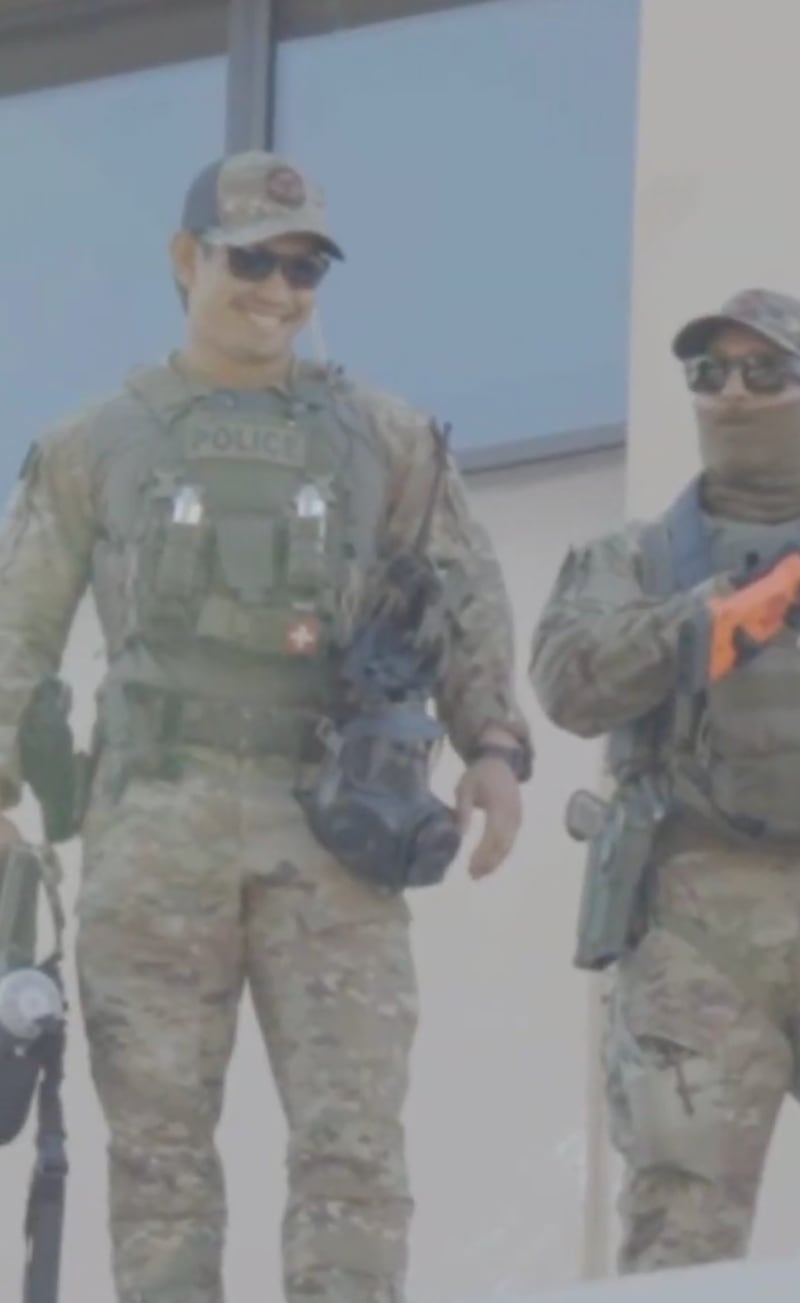 The ICE officer smiled after he allegedly shot Robby Roadsteamer.