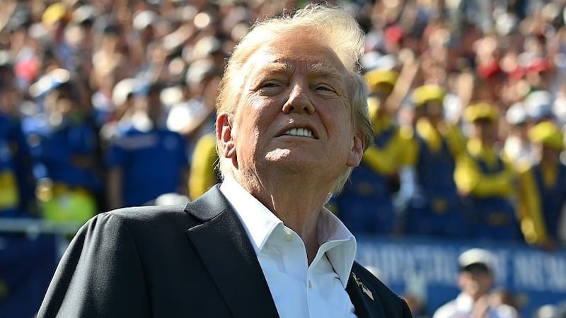 U.S. President Donald Trump attends the 2025 Ryder Cup at Black Course at Bethpage State Park Golf Course on September 26, 2025 in Farmingdale, New York. In his second term, Trump has attended several major sporting events.  (Photo by Mandel Ngan-Pool/Getty Images)