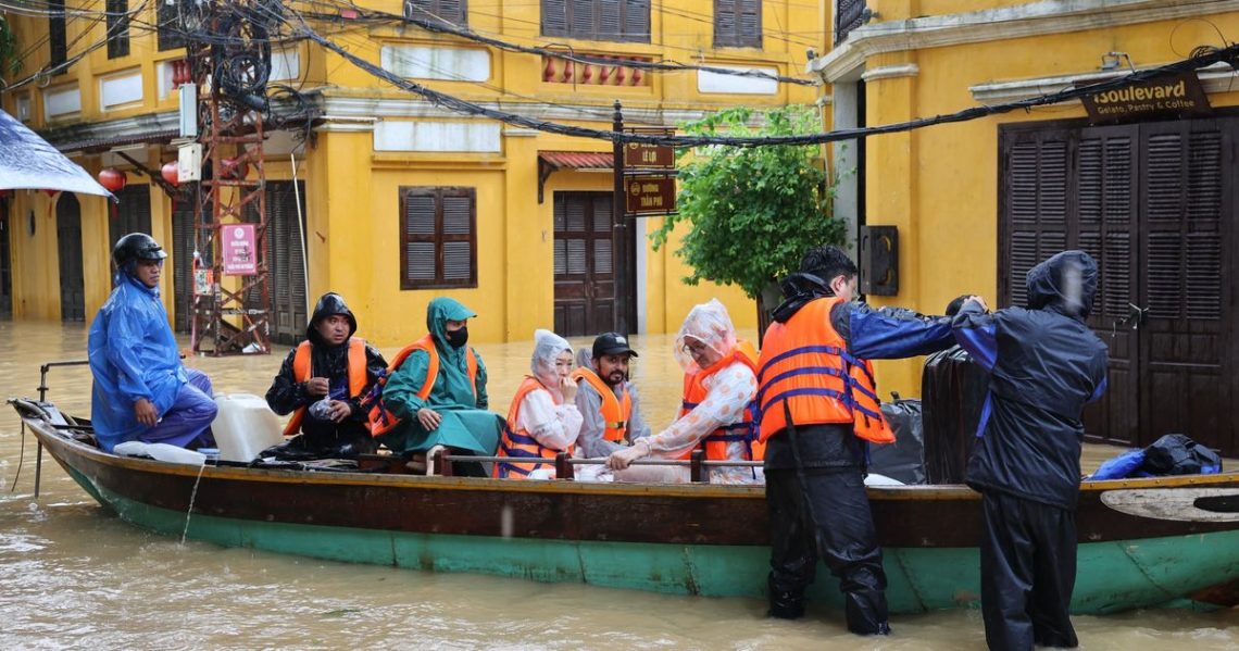 Deadly floods batter central Vietnam, killing at least 10