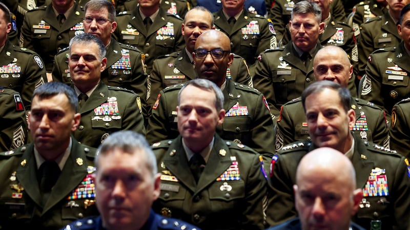 Members of the military attend a meeting convened by U.S. Defense Secretary Pete Hegseth, at Marine Corps Base Quantico, in Quantico, Virginia, U.S., September 30, 2025. REUTERS/Kevin Lamarque