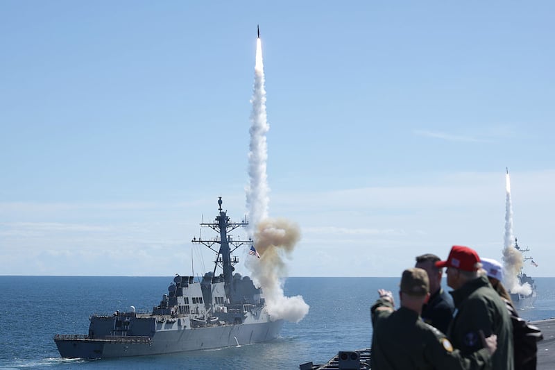 U.S. President Donald Trump observes a demonstration from the deck of the USS George H.W. Bush aircraft carrier on October 5, 2025 off the eastern coast of the United States. President Trump is visiting Naval Station Norfolk in Virginia for a celebration of the 250th birthday of the U.S. Navy. (Photo by Alex Wong/Getty Images)