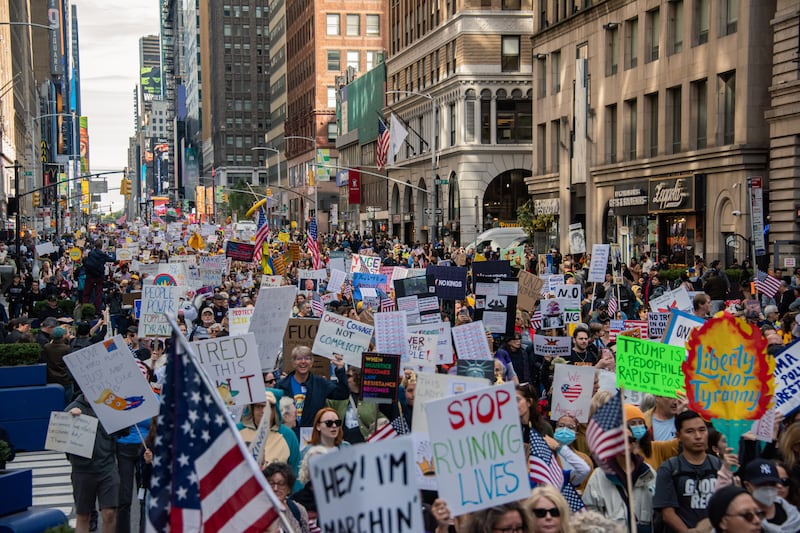 Over one hundred thousand people gather and march in Manhattan, New York City, on October 18, 2025, for the No Kings protest. Peaceful demonstrations take place across the country as millions advocate against the policies of the Trump Administration. No arrests are made in New York City. (Photo by Neil Constantine/NurPhoto via Getty Images)