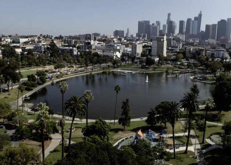 Drugs, crime and homelessness plague MacArthur Park. Can a multimillion-dollar fence rescue it?