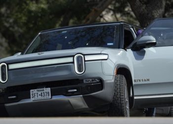 EV truck maker Rivian is laying off hundreds amid a slowdown in demand