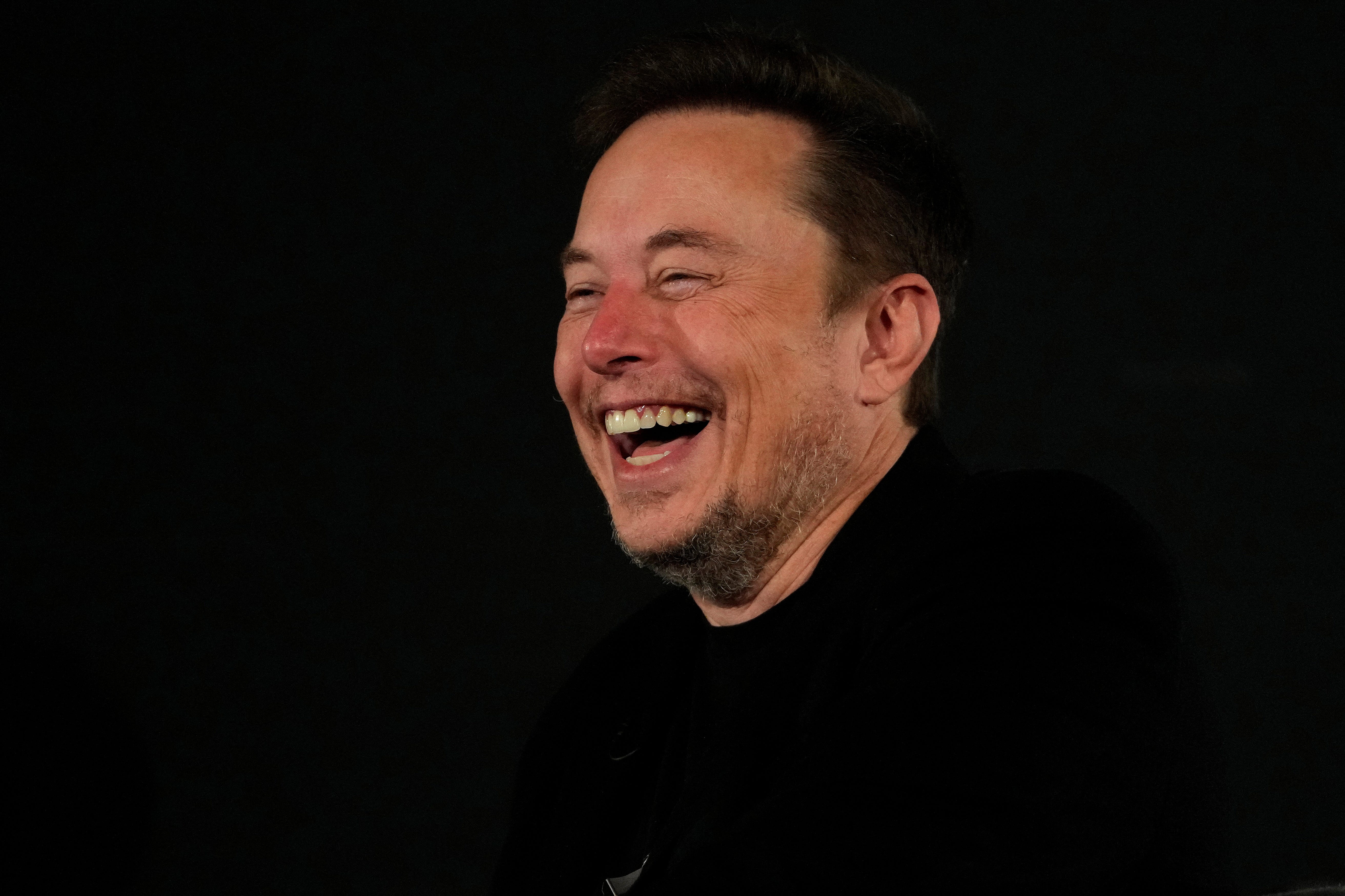 Tesla and SpaceX's CEO Elon Musk laughs during an in-conversation event with British Prime Minister Rishi Sunak in London, Britain, Thursday, Nov. 2, 2023.