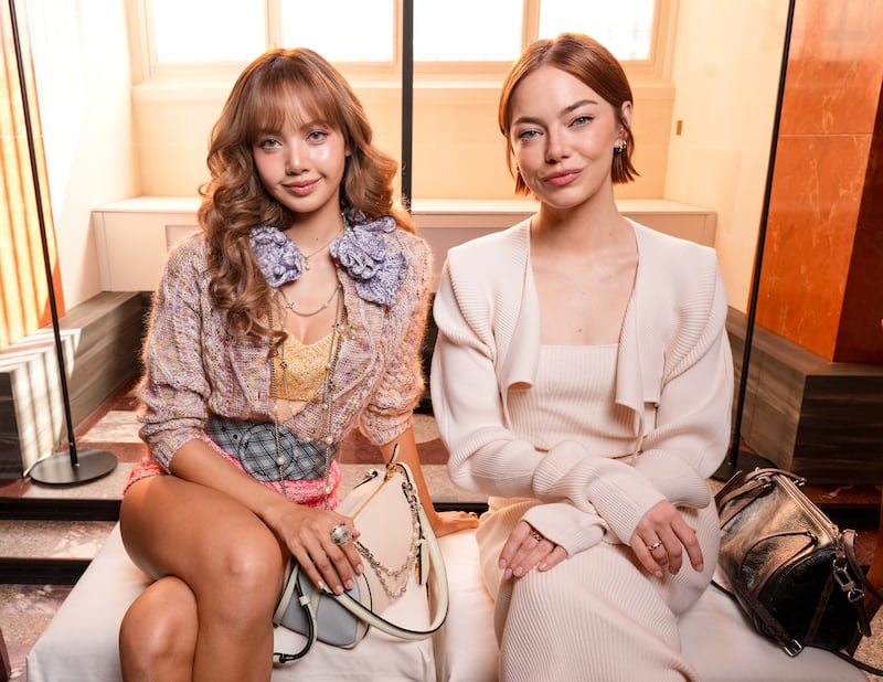 Lisa and Emma Stone at the Louis Vuitton Fashion Show