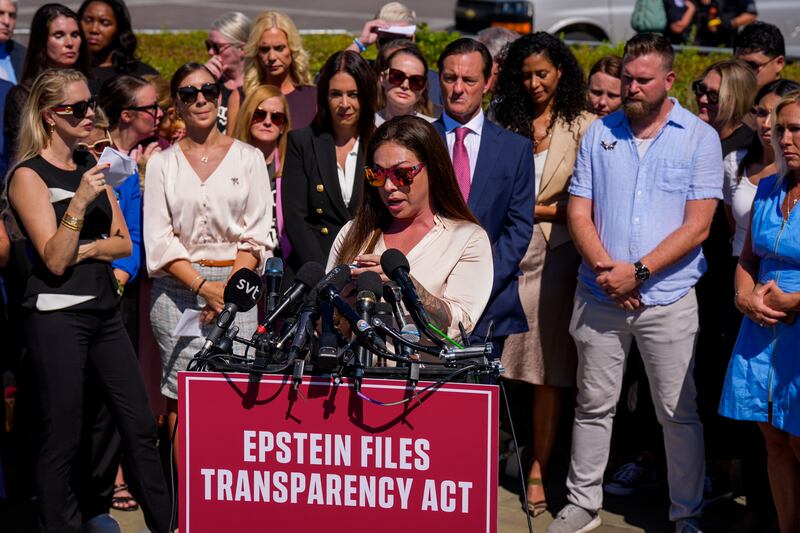 Haley Robson and other Epstein survivors speak at a press conference outside the US capitol