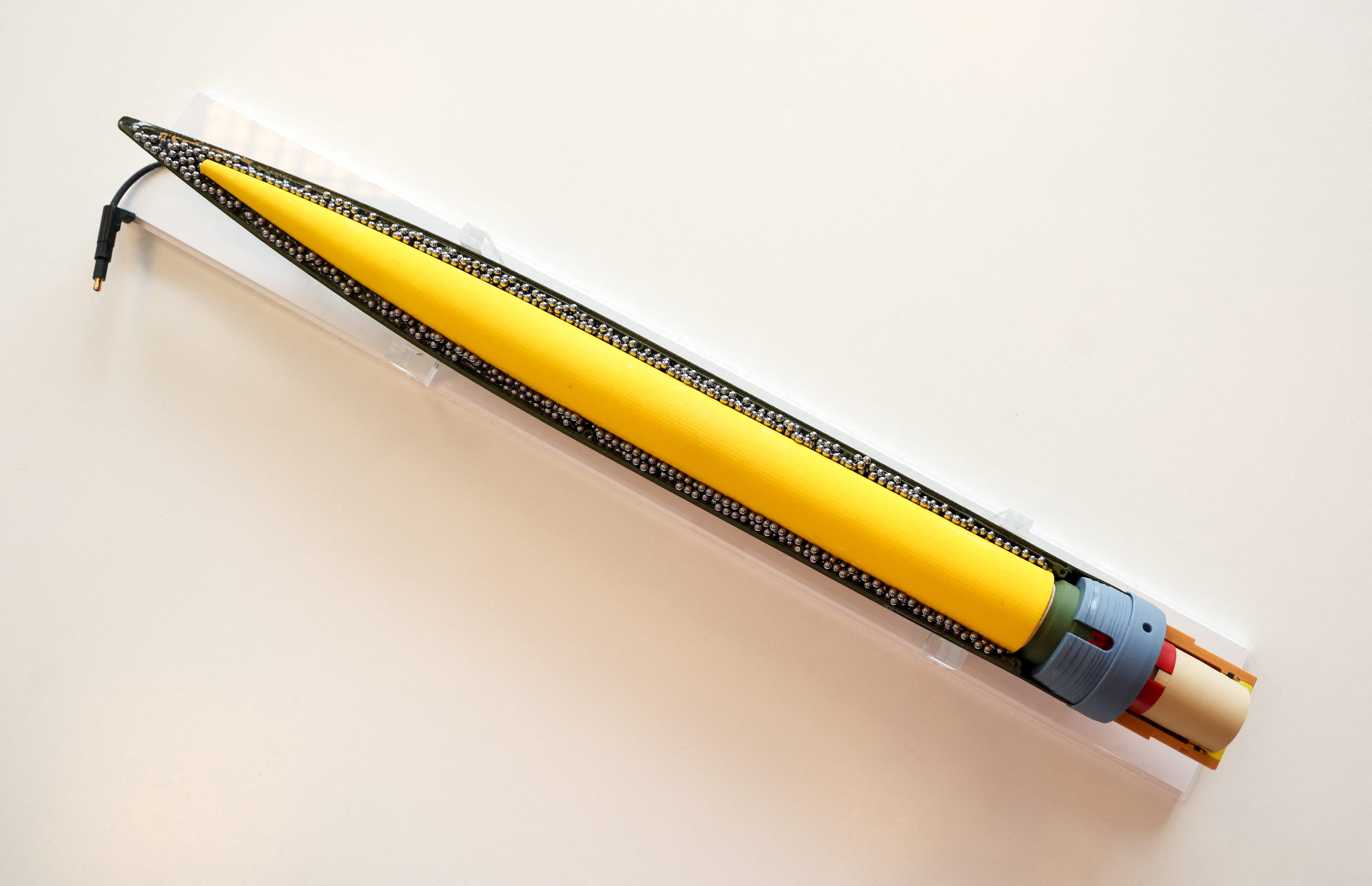 An overview photo of the FZ123 warhead on a table.