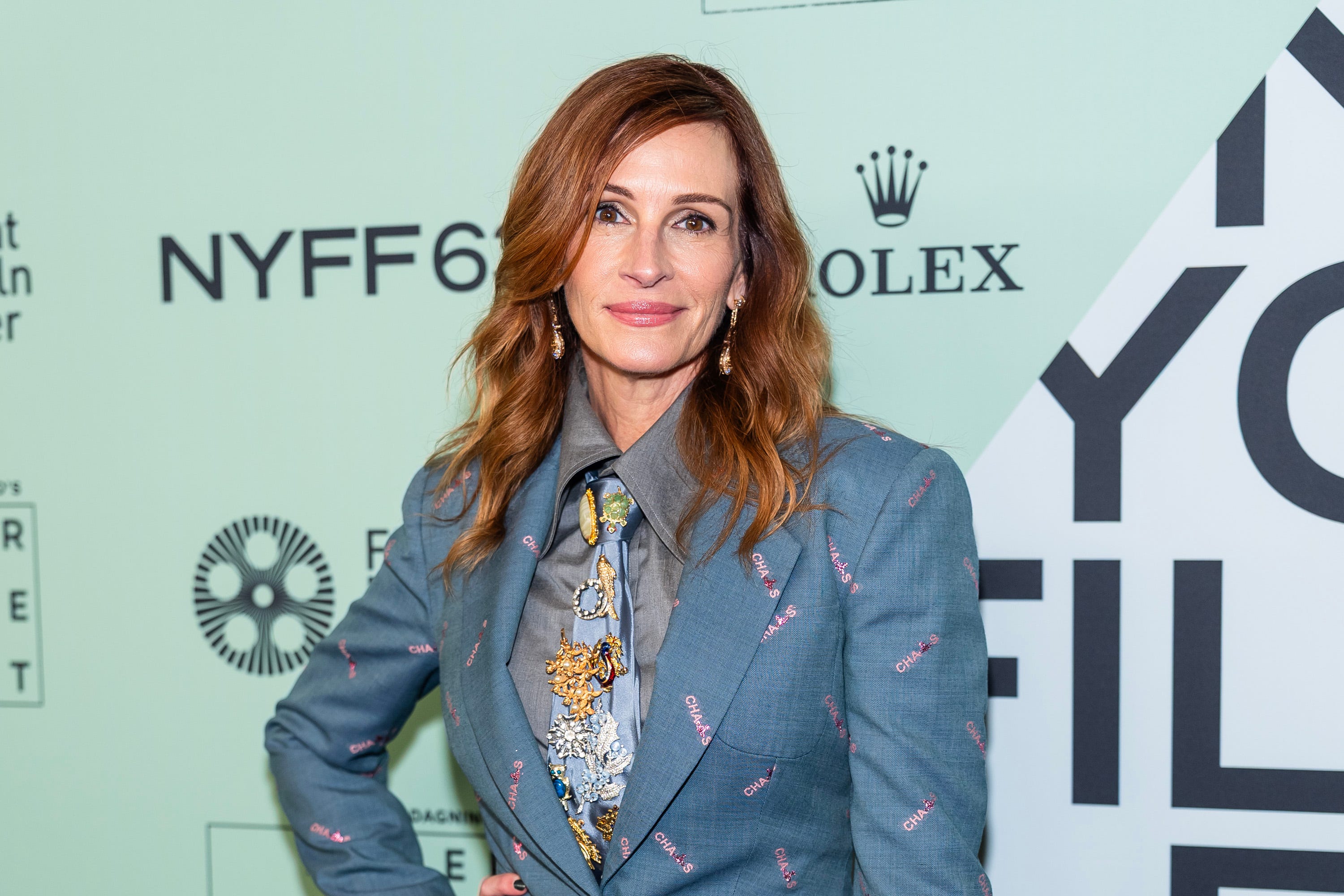 Julia Roberts in a colorful jacket and tie