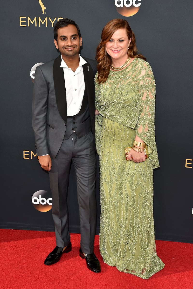 Actor Aziz Ansari (L) and actress Amy Poehler
