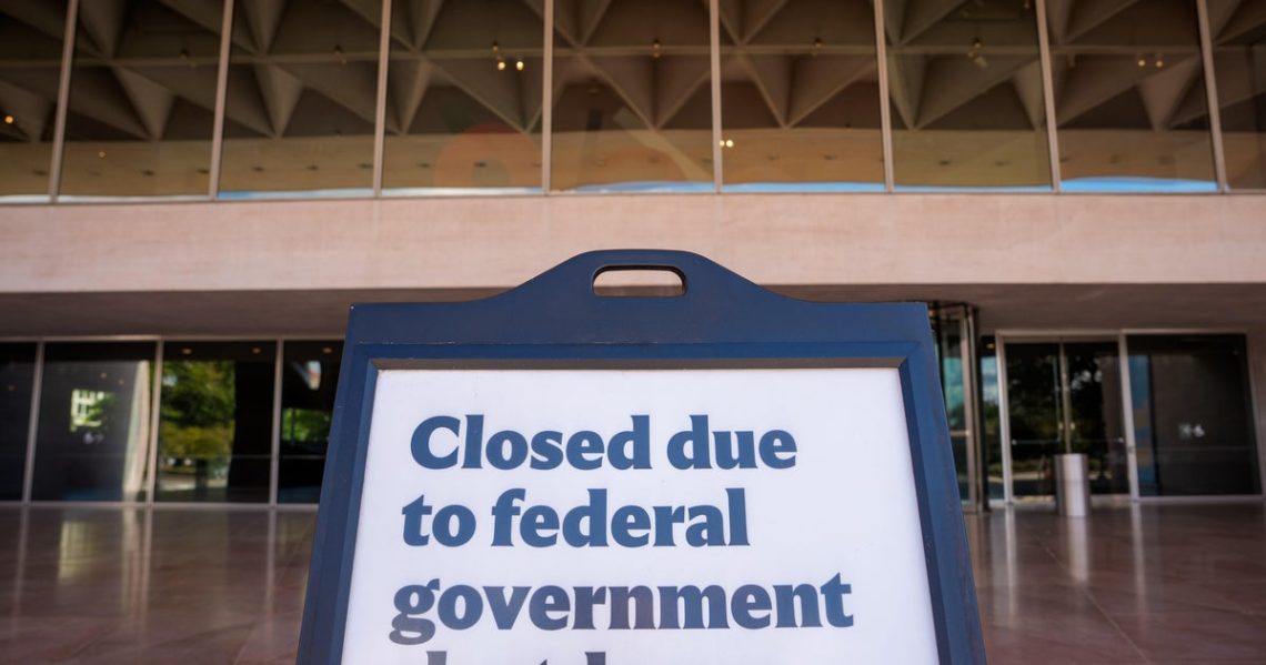 Federal workers hunker down as they go without pay amid government shutdown
