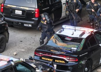 Feds charge 12 in alleged violence, attacks on police during immigration protests