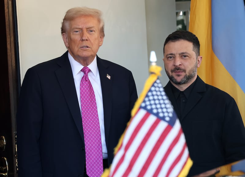 WASHINGTON, DC - OCTOBER 17: U.S. President Donald Trump (L) greets Ukrainian President Volodymyr Zelensky outside the West Wing of the White House on October 17, 2025, in Washington, DC. President Trump, fresh off a ceasefire agreement between Israel and Hamas, is hosting President Zelensky for a bilateral lunch in the Cabinet Room in hopes of advancing a peace deal between Russia and Ukraine. (Photo by Win McNamee/Getty Images)