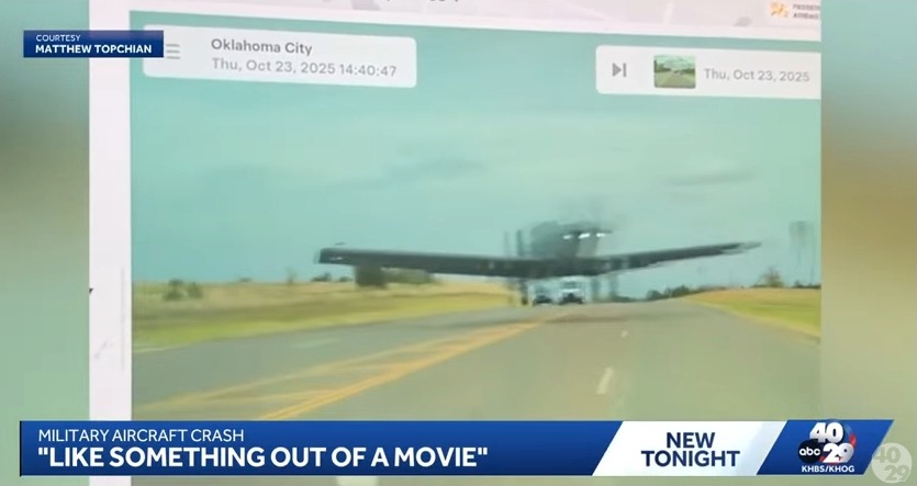 Footage of a military aircraft crashing onto a road in Oklahoma City.