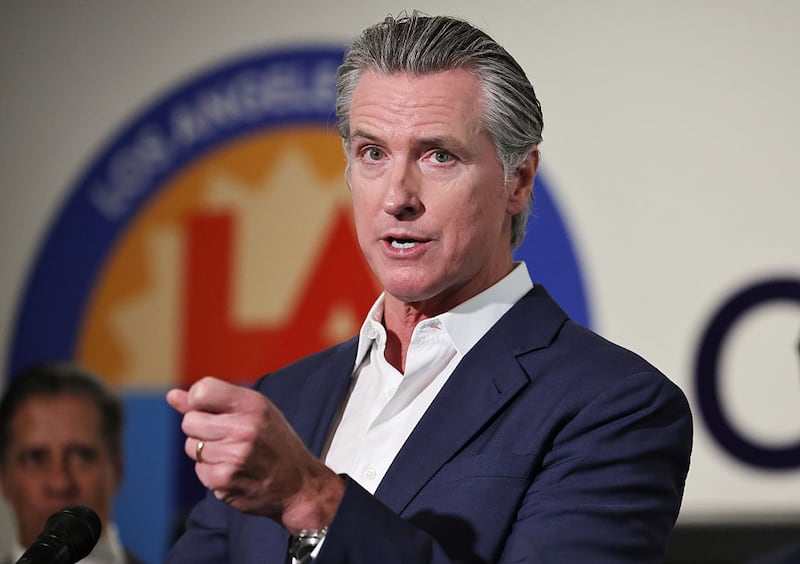 California Governor Gavin Newsom speaks at Belvedere Middle School before signing legislation aimed at improving kids' nutrition and health across California on October 8, 2025 in Los Angeles, California. The bill bans ultra-processed foods (UPFs) from school meals in the state.