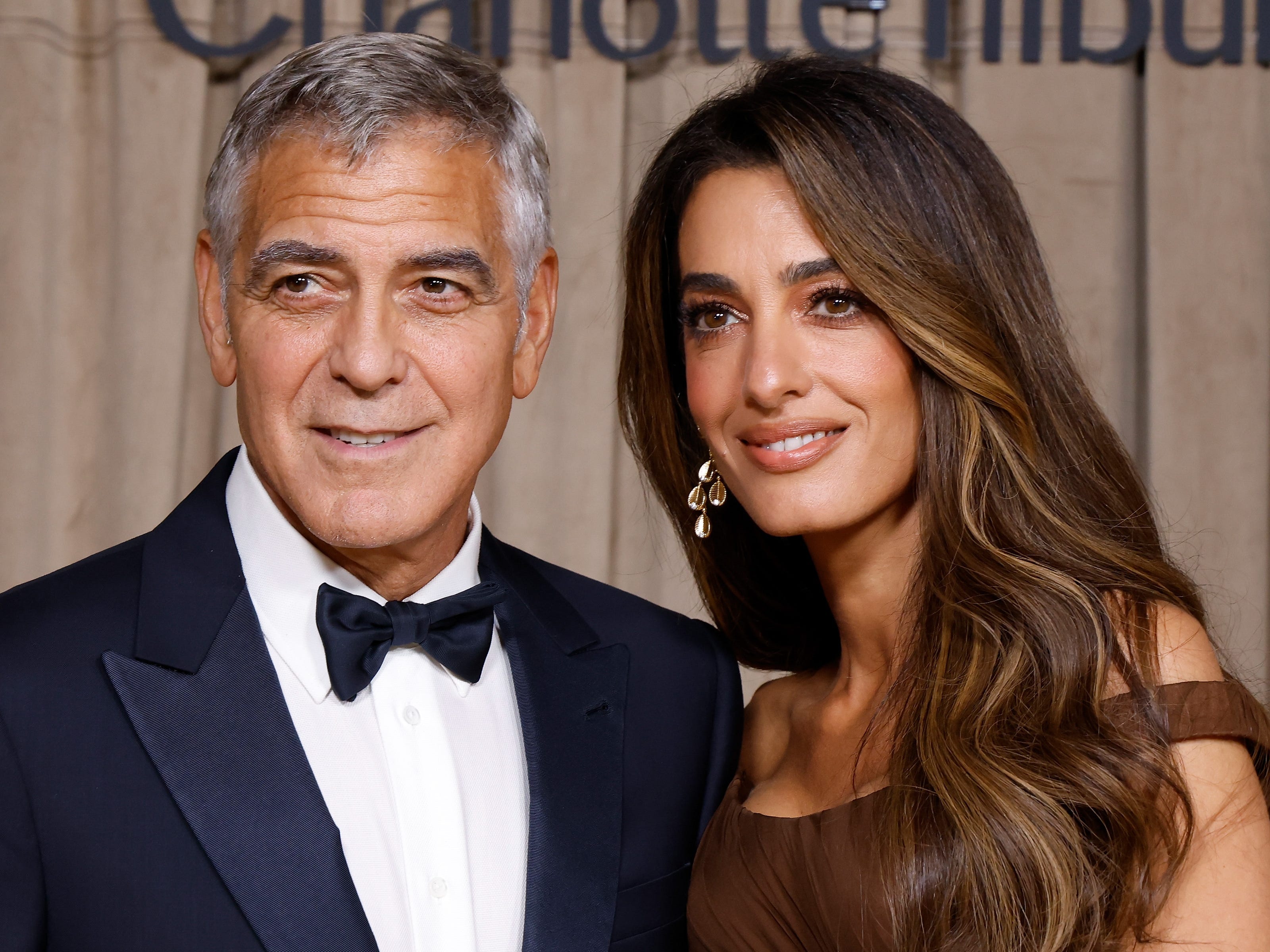 George Clooney and Amal Clooney.