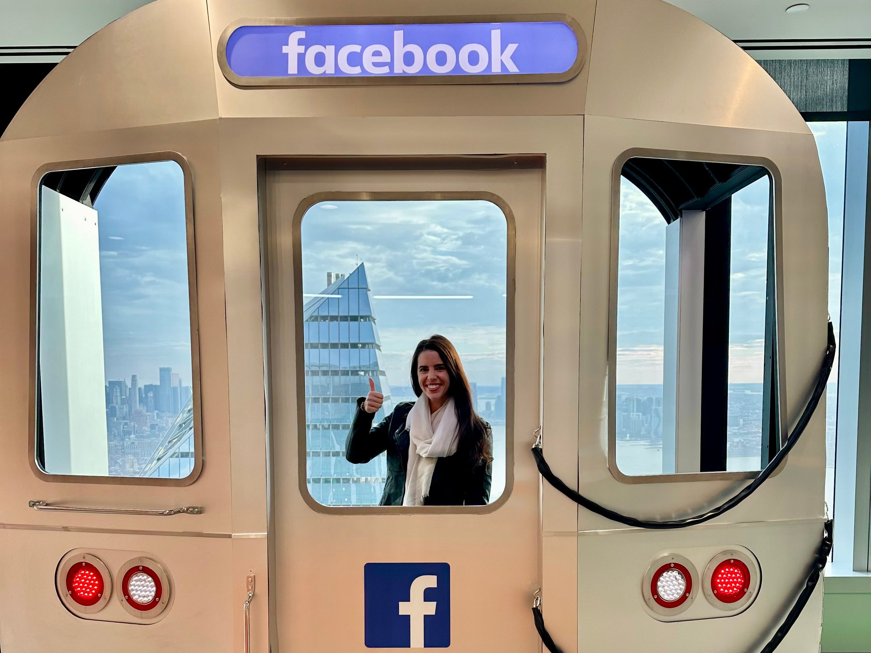 Alaina Appleman is posing in a Facebook sign.