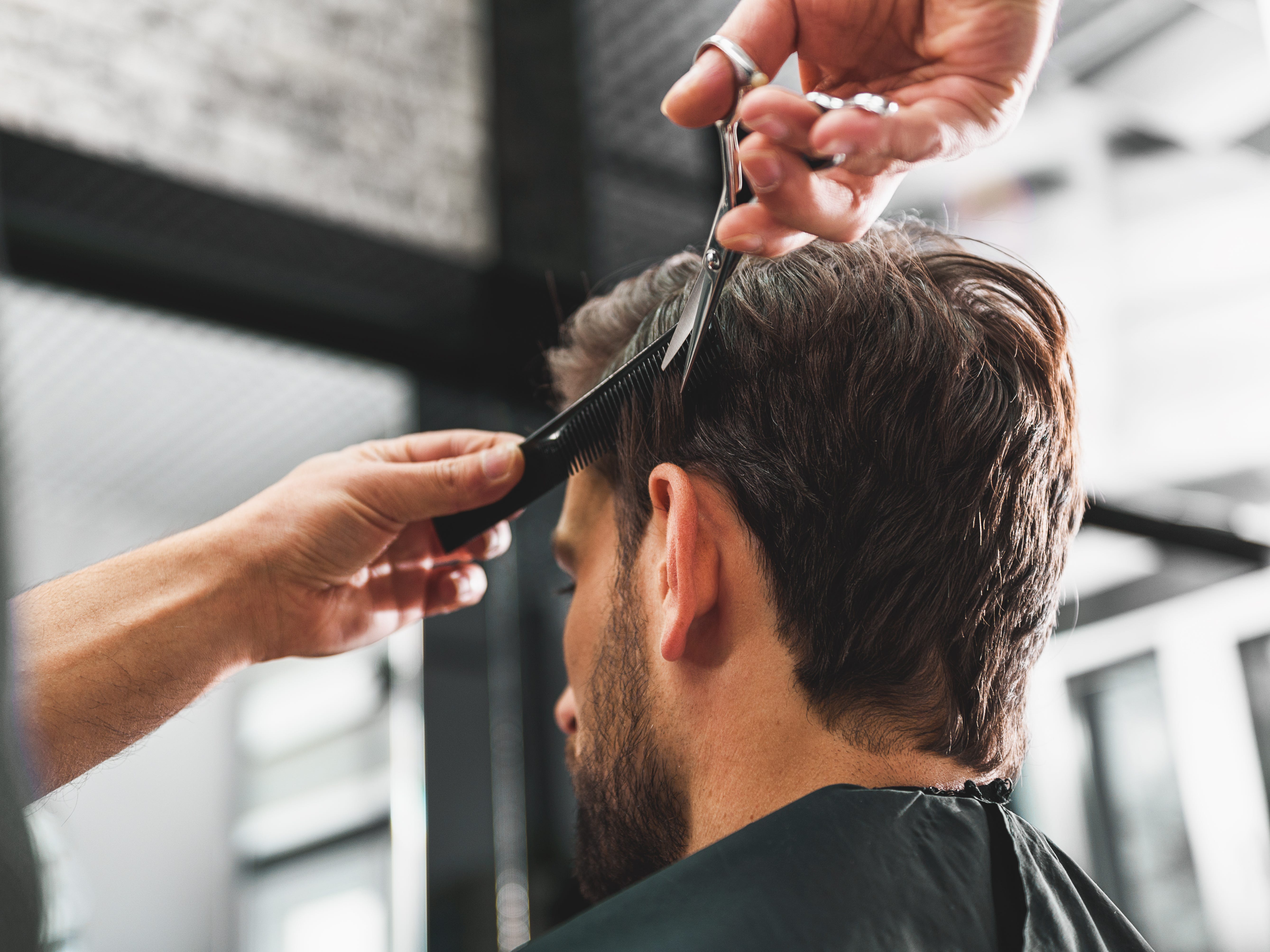 A man getting a haircut.