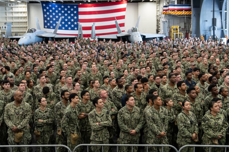 YOKOSUKA, JAPAN - OCTOBER 28: Troops listen to a speech by U.S. Secretary of War Pete Hegseth (not pictured) ahead of the arrival of President Donald Trump aboard USS George Washington on October 28, 2025 in Yokosuka, Japan. Trump is visiting Japan, fresh off an appearance at the ASEAN summit in Malaysia, and will next travel to South Korea for the APEC meetings. (Photo by Tomohiro Ohsumi/Getty Images)