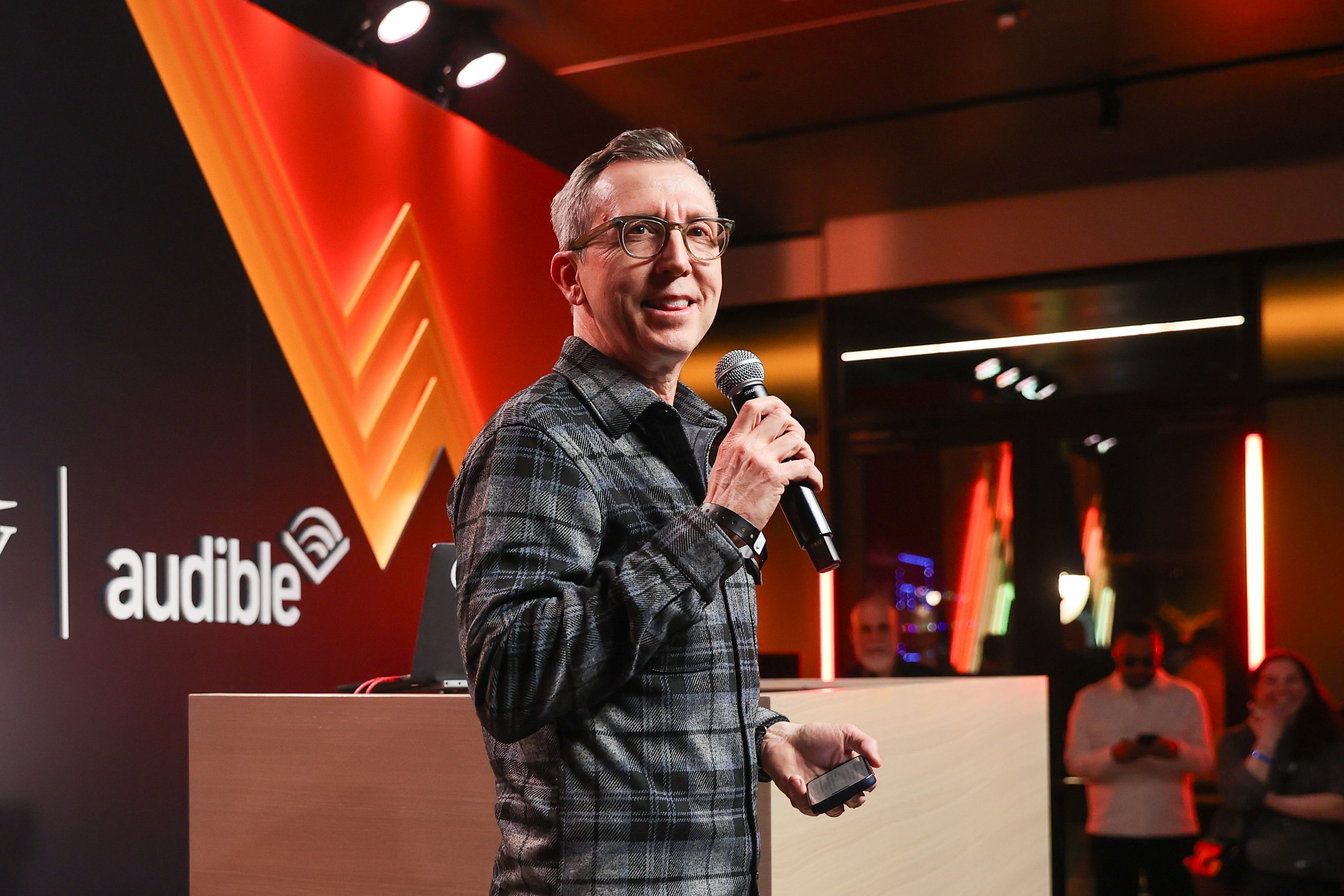 Bob Carrigan with a microphone