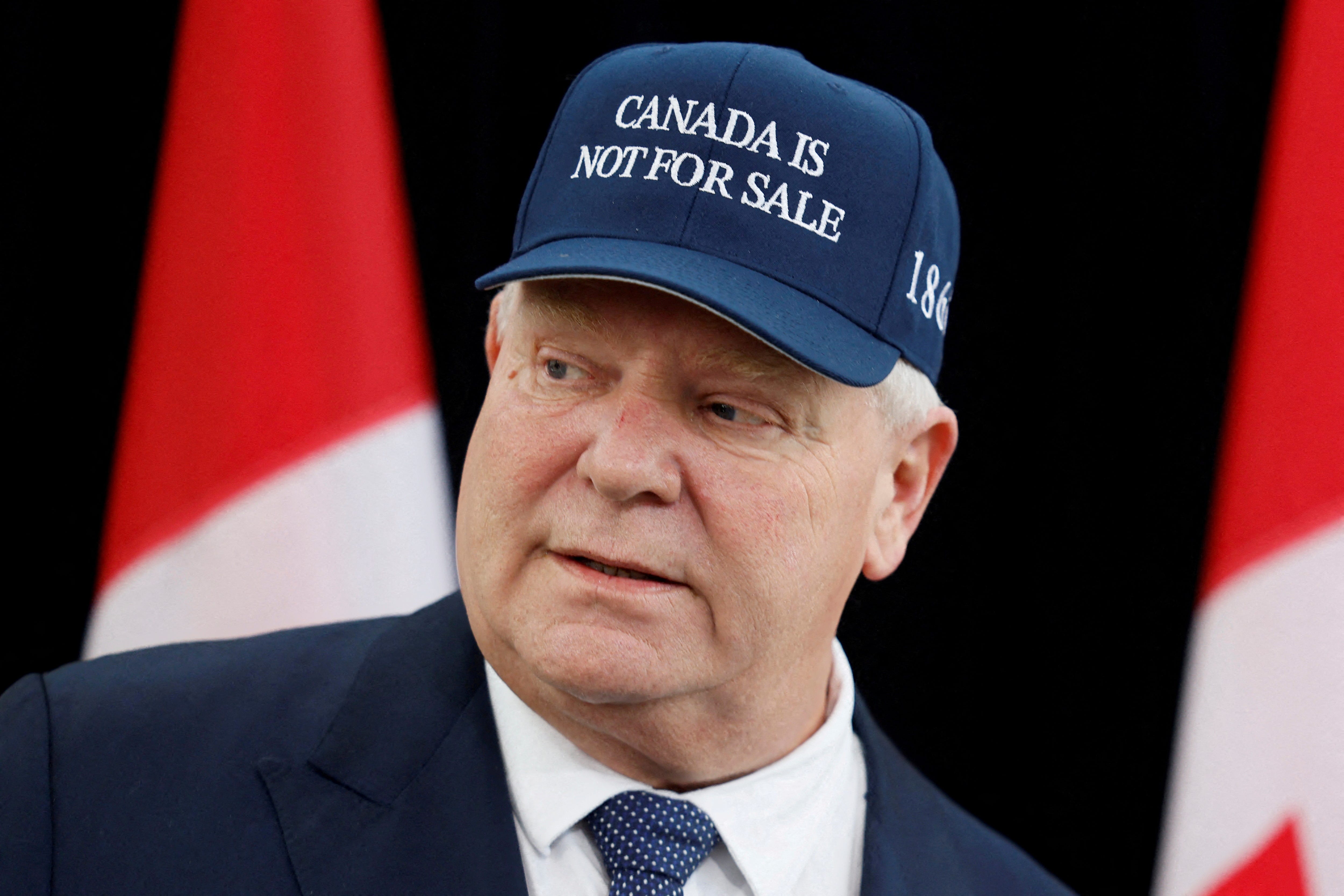 Ontario Premier Doug Ford speaks to journalists at a provincial and territorial leaders meeting in Ottawa