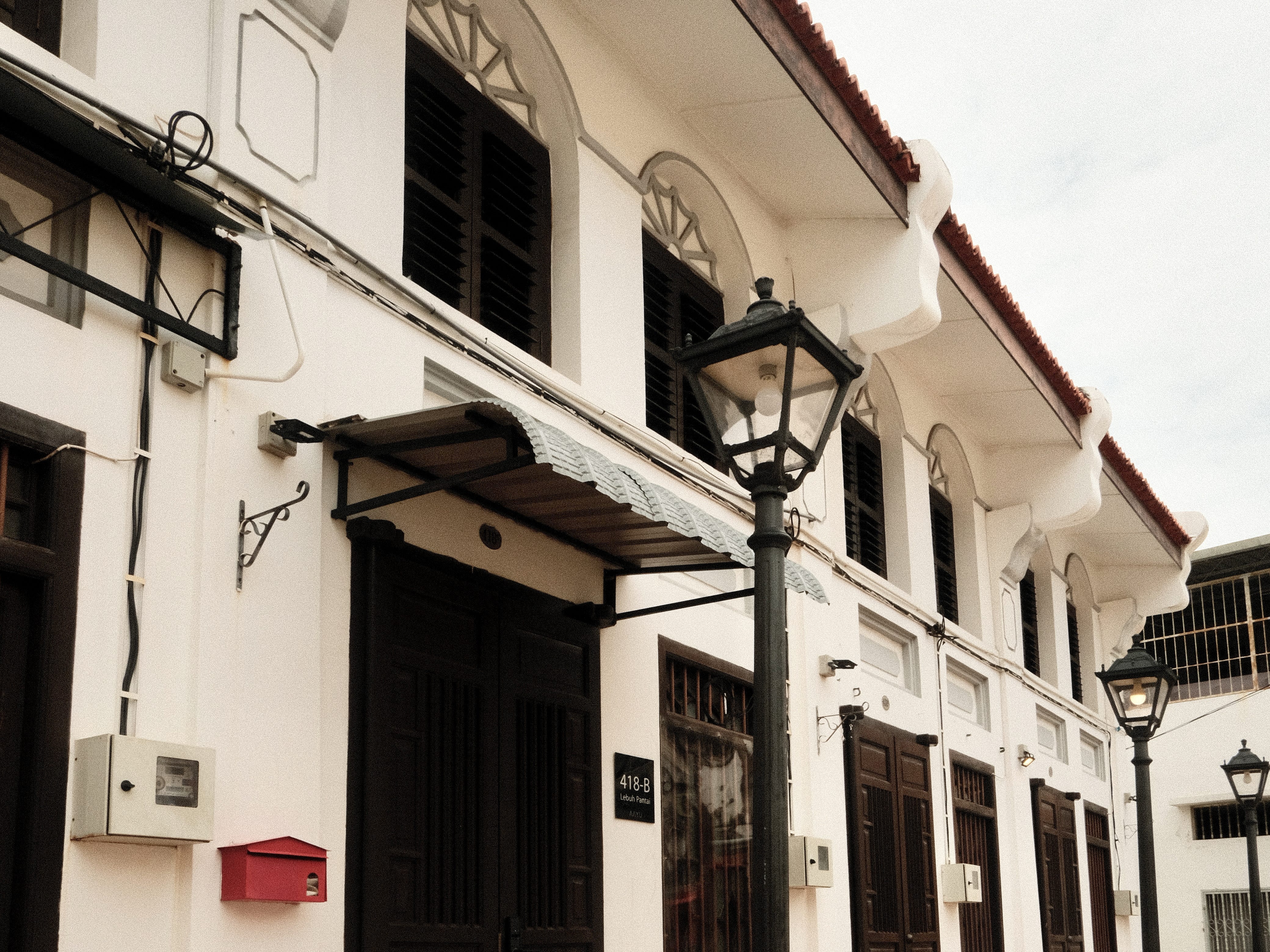 Exterior of one of the heritage homes managed by Aayu Homes in Penang, Malaysia.