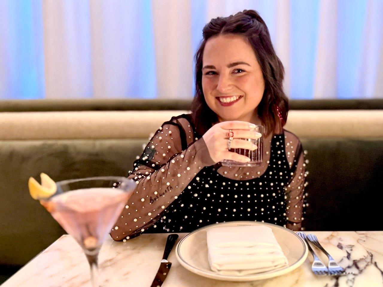 Author Kelsey Huson drinking Big Yeti with The Alchemy in foreground