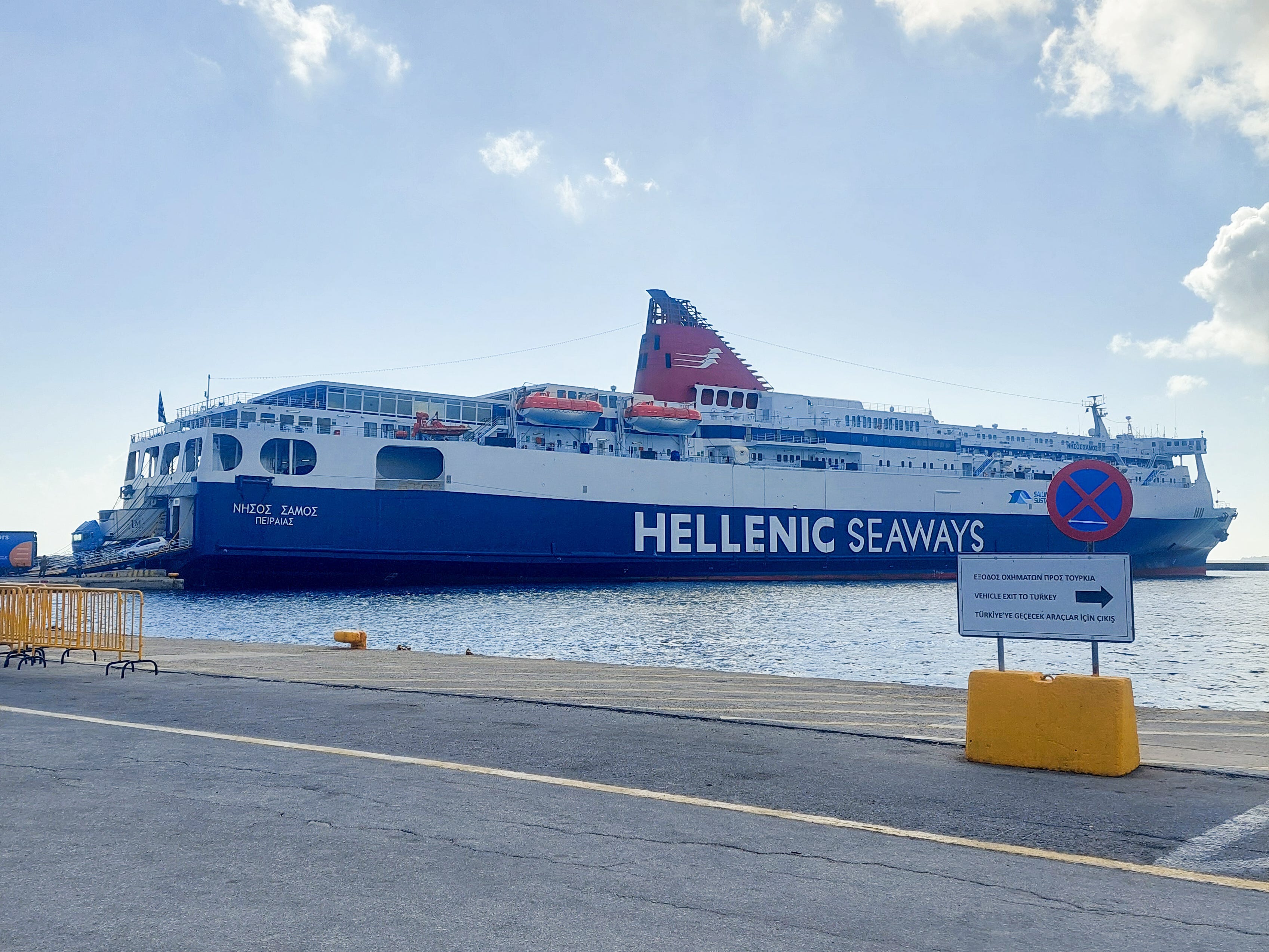 A docked ferry with the words