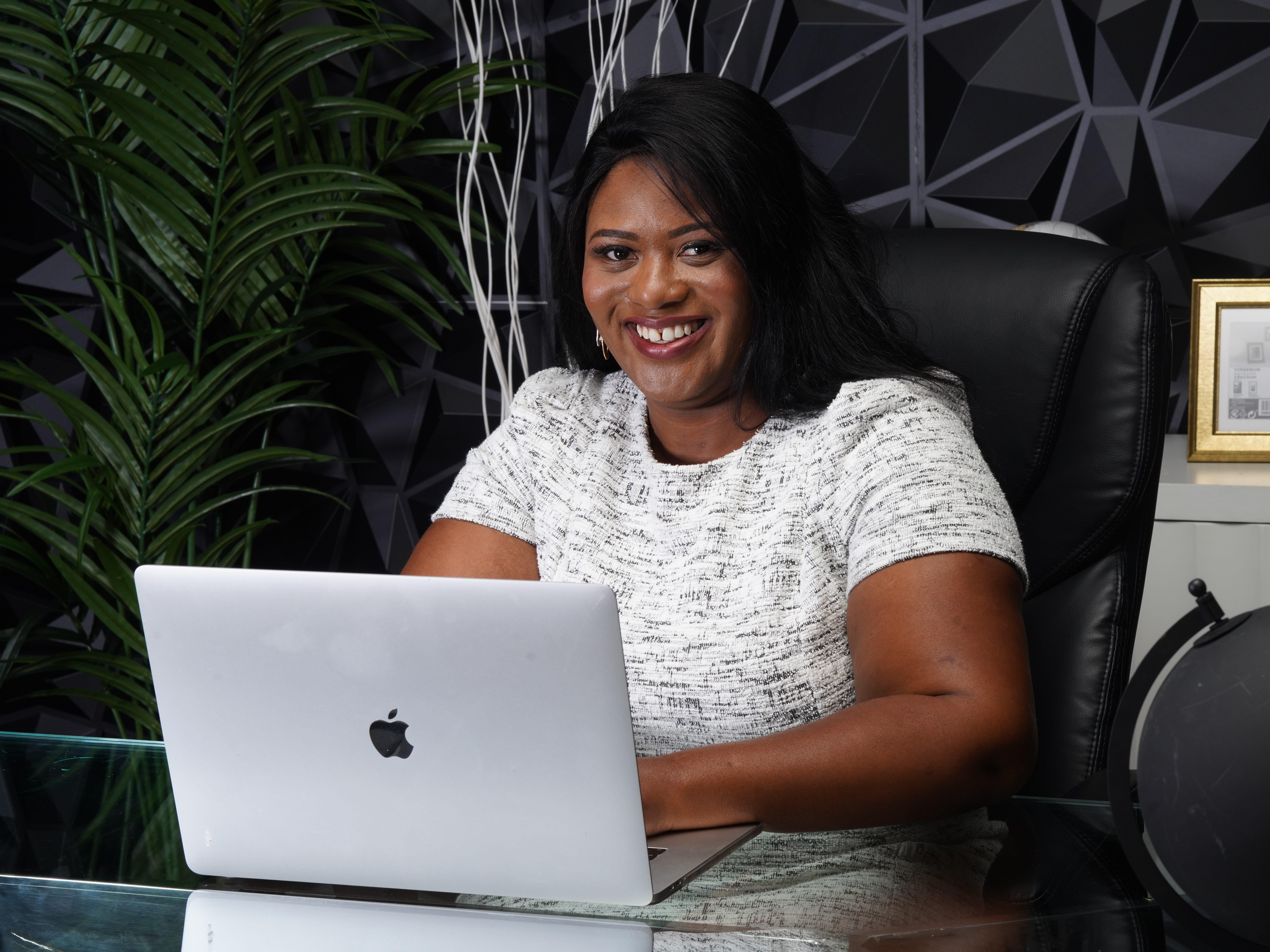 Janelle Jones on her laptop