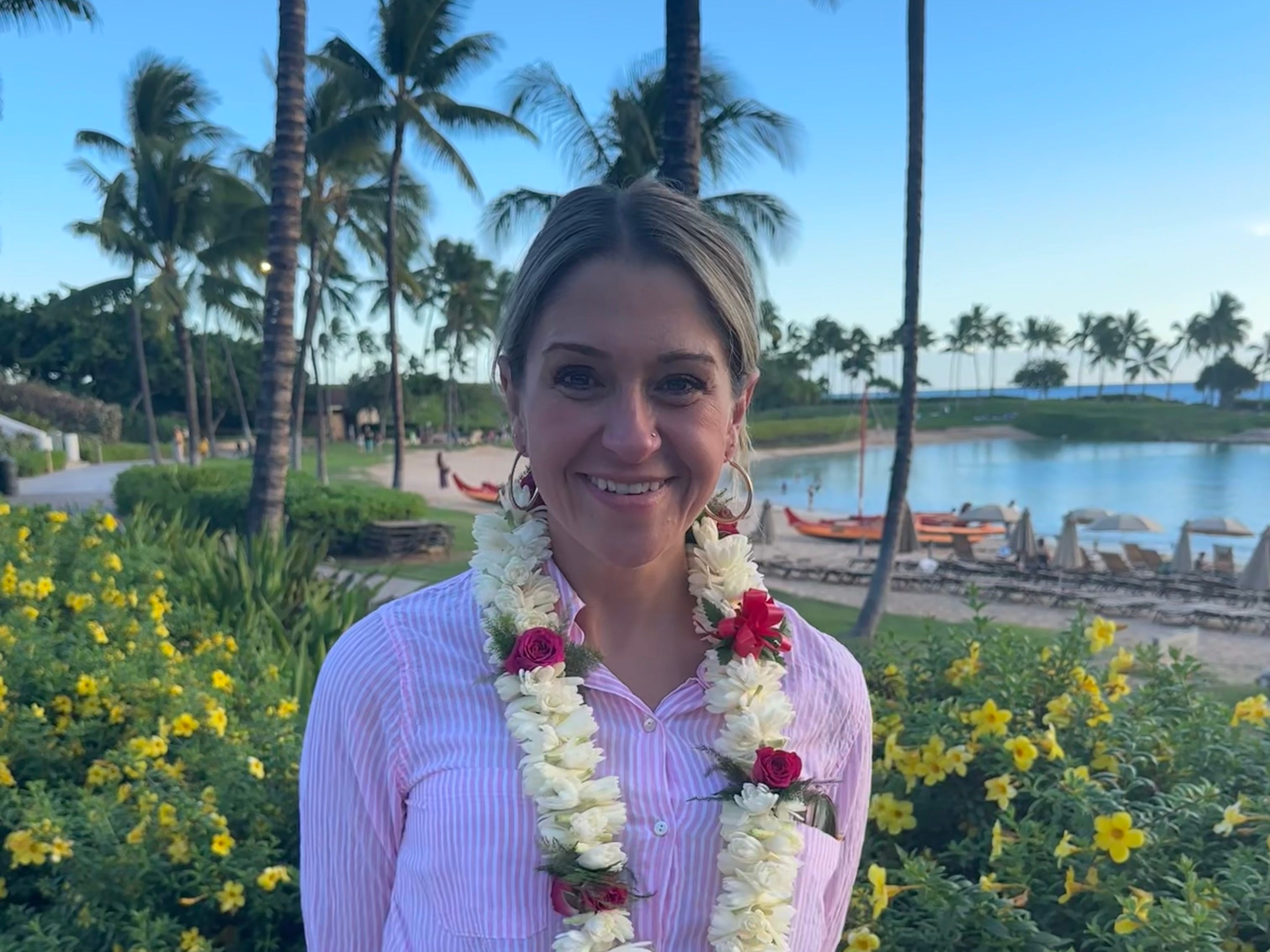 Terri Peters is wearing a lei in Oahu, Hawaii.
