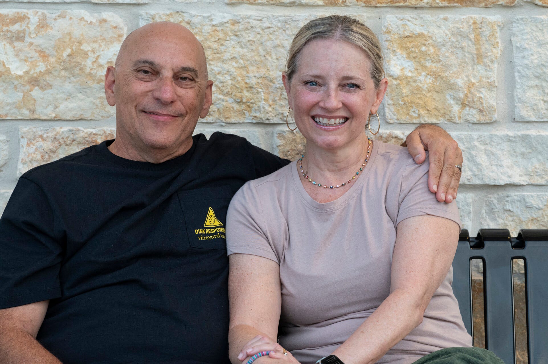 Author Lynnette Lyons and her husband smiling