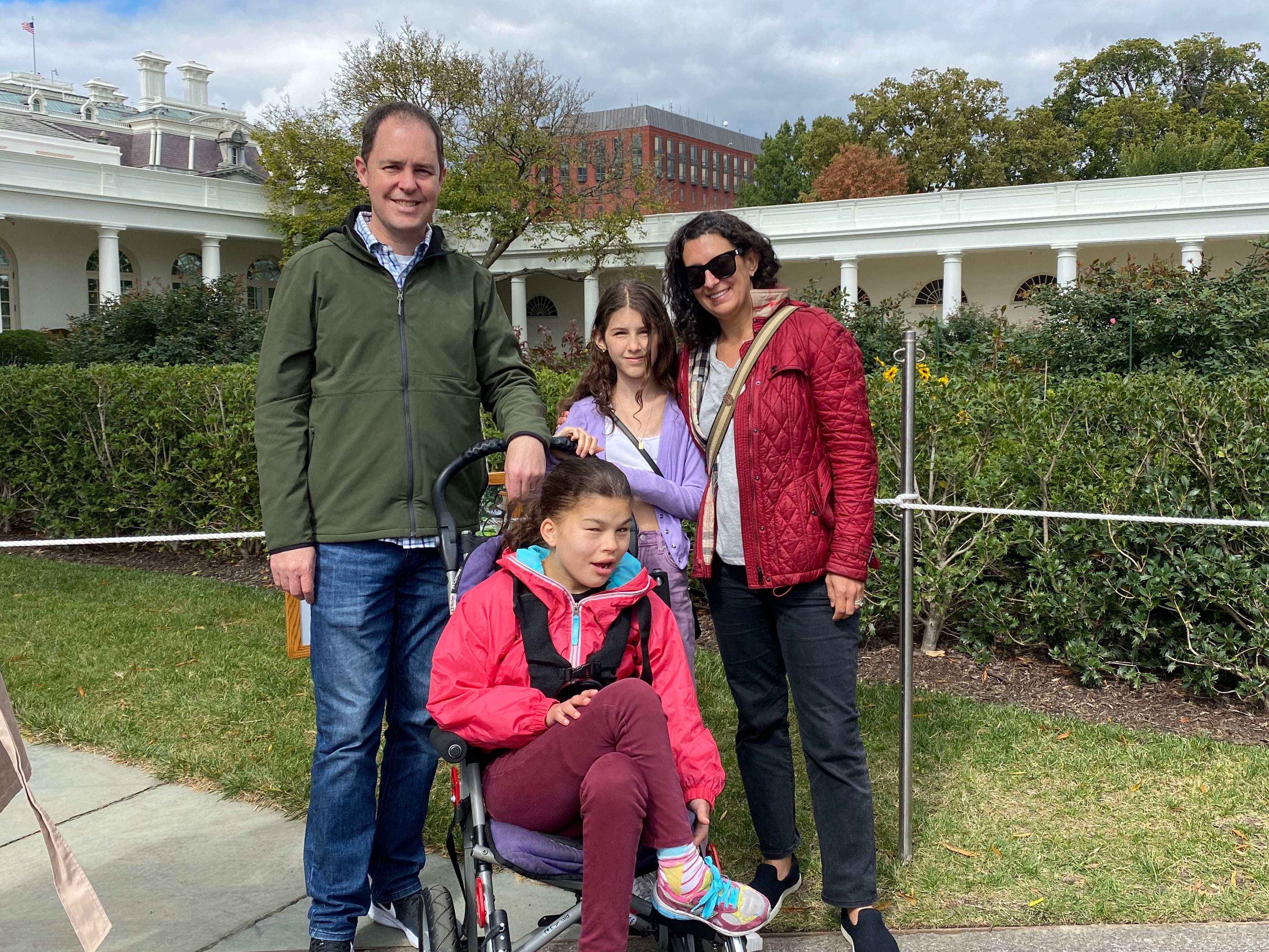 The author with two of her kids and her husband.