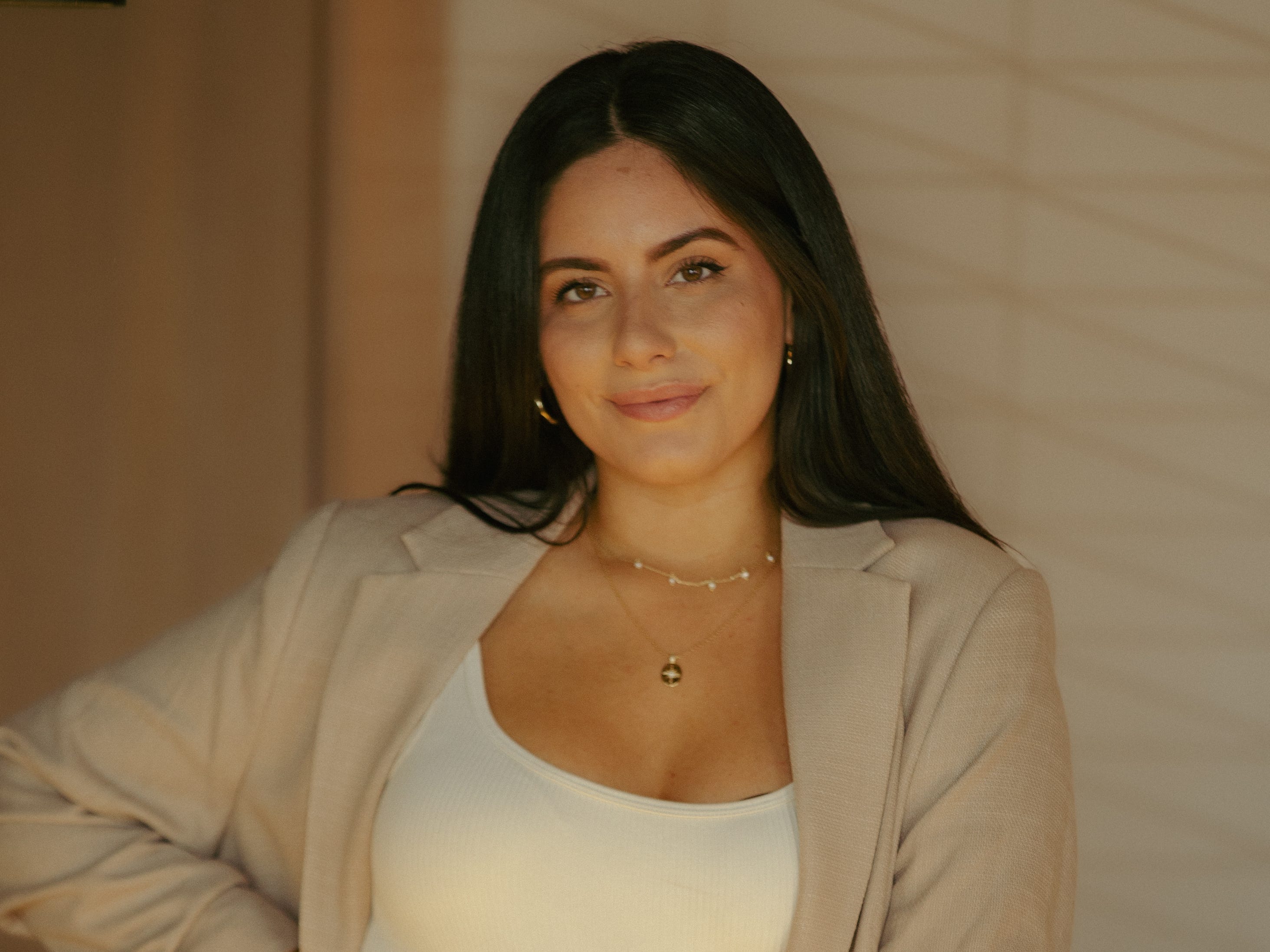 Natalia Molina with hand on hip