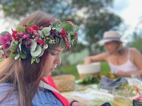 The author's daughter is showing at a lei workshop.