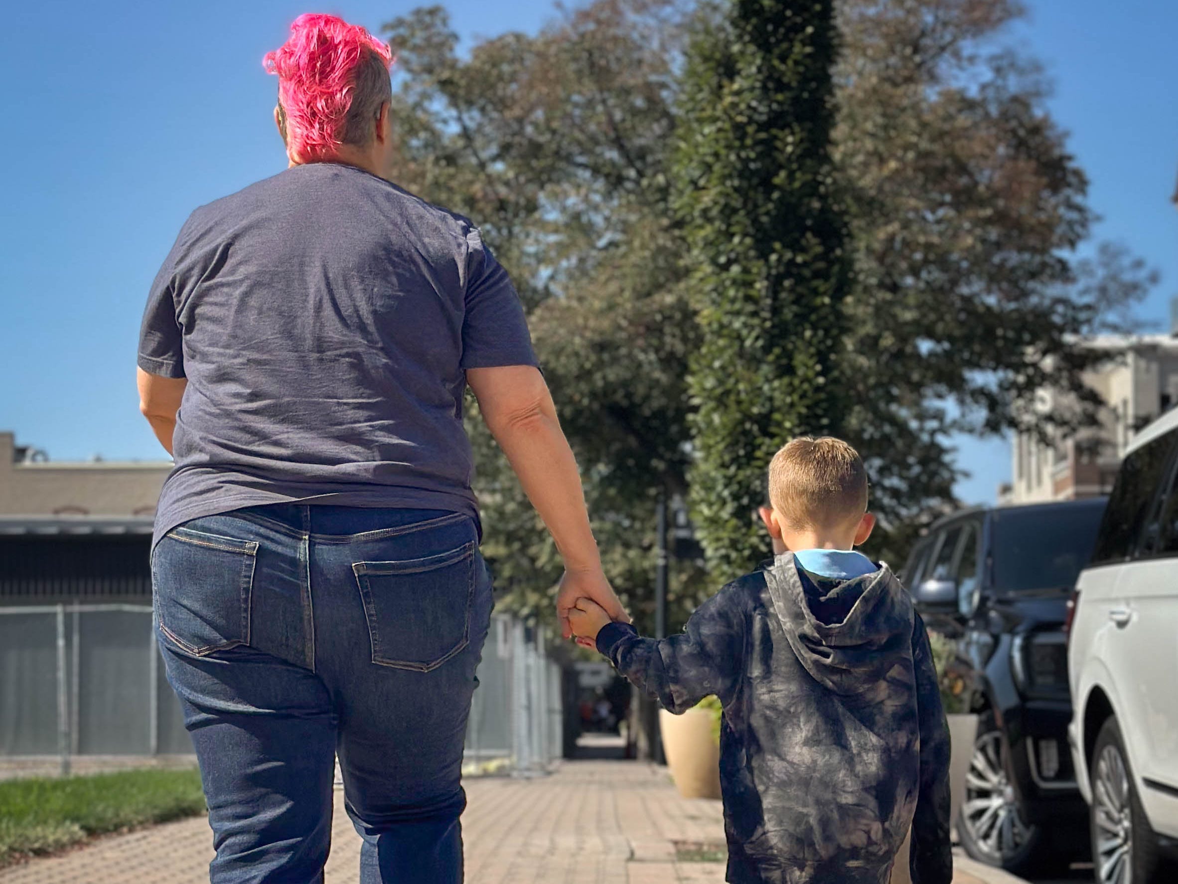 Grandma walking with grandson